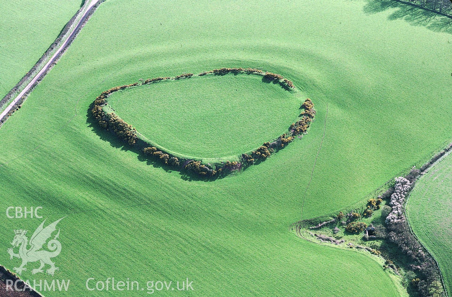 Slide of RCAHMW colour oblique aerial photograph of Merrion Camp, Castlemartin, taken by C.R. Musson, 1993