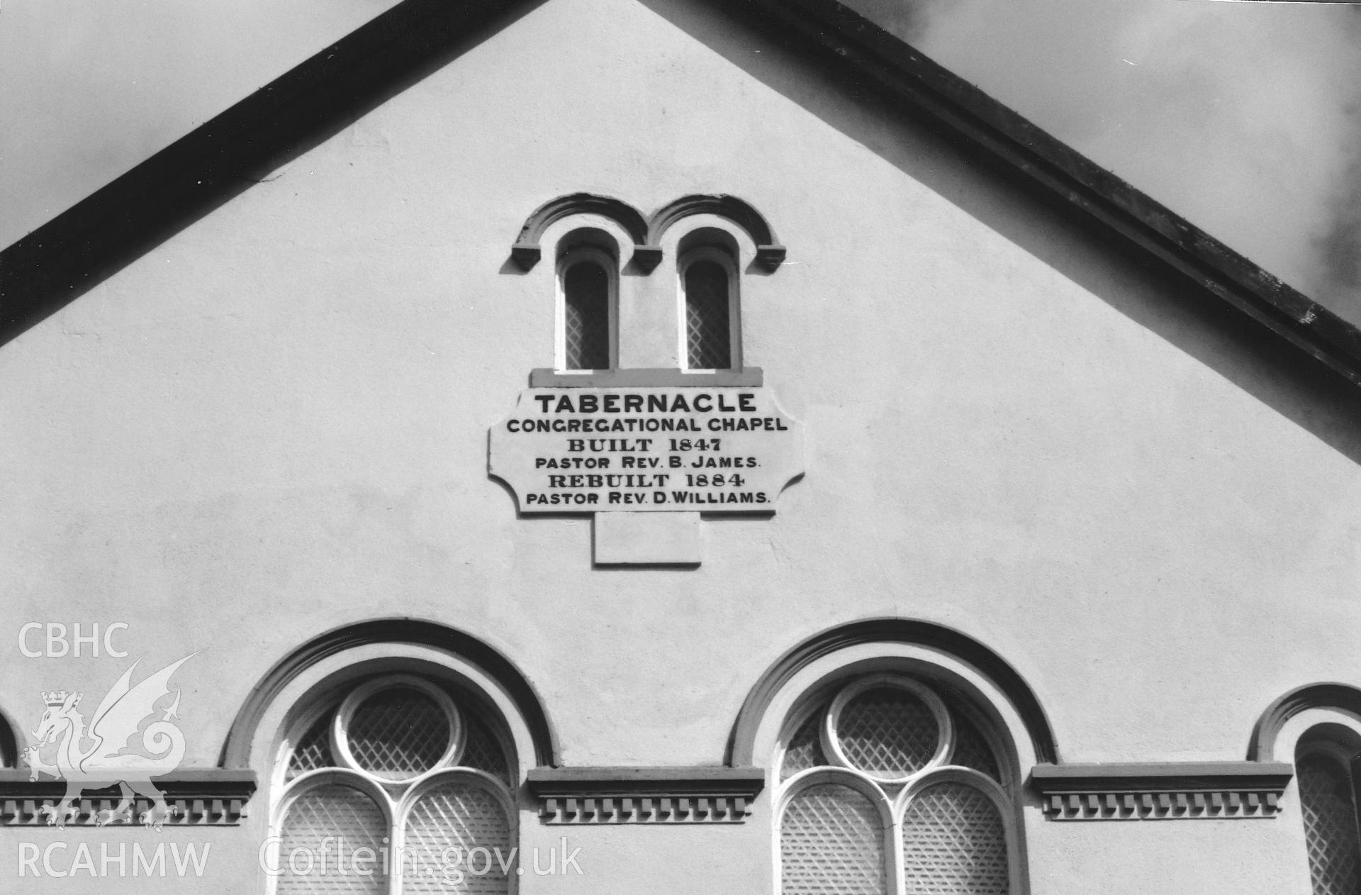 Digital copy of a black and white photograph showing a view of datestone at Tabernacle Independent Chapel, Maenclochog, taken by Robert Scourfield, 1996.