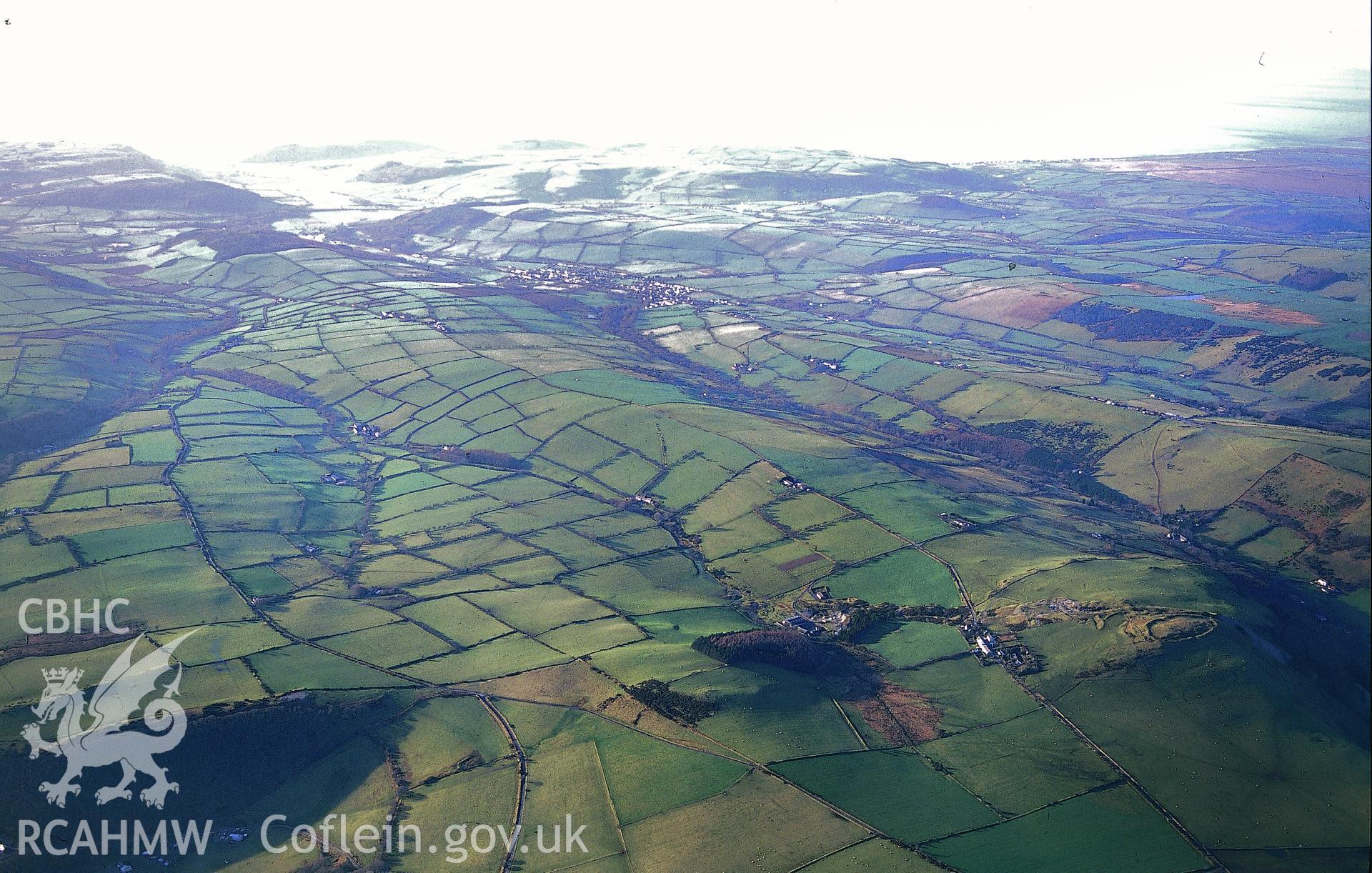 Slide of RCAHMW colour oblique aerial photograph showing Darren Hillfort, Trefeurig, taken by Toby Driver, 2001.