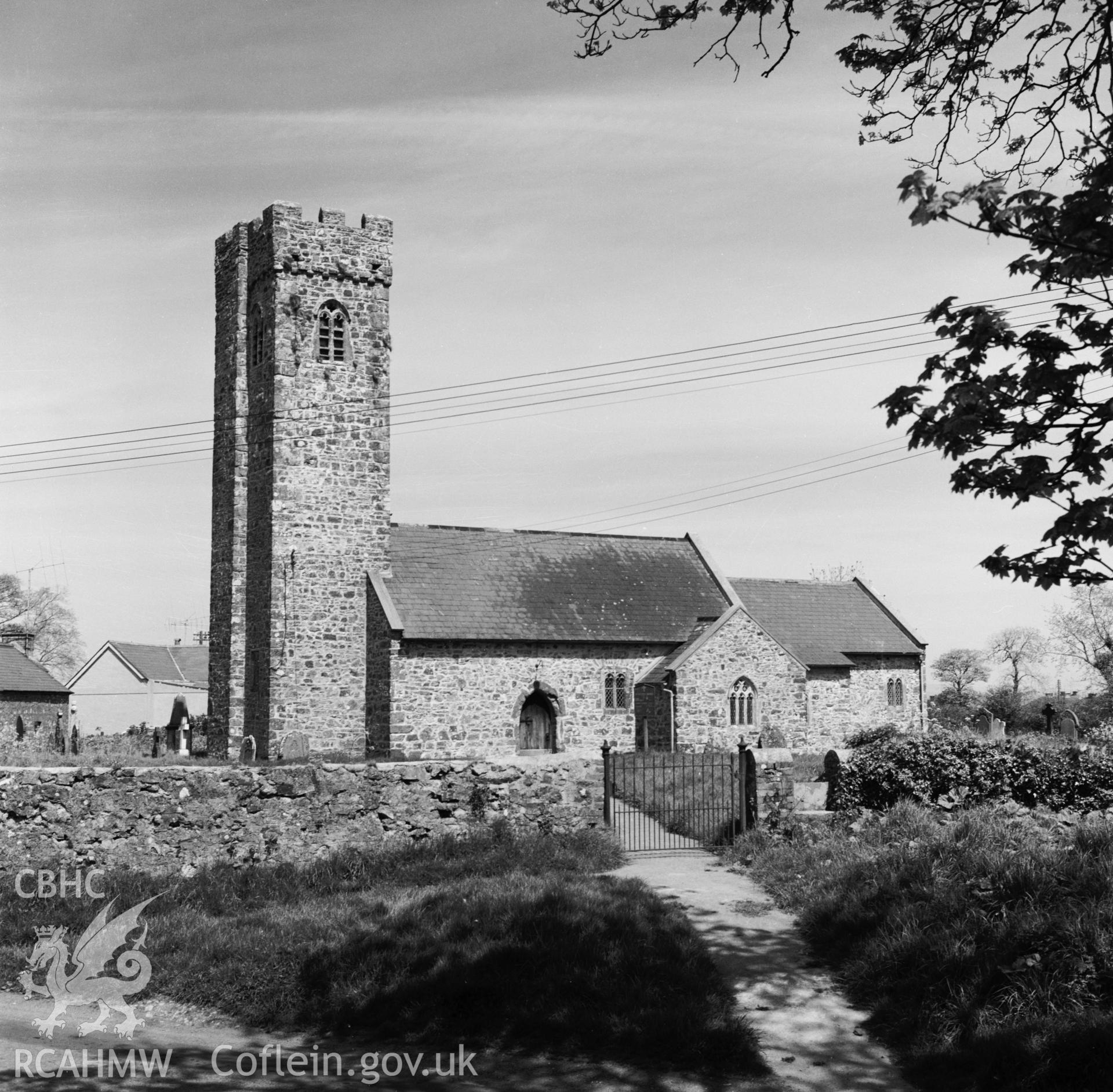 RCAHMW black and white photograph showing the exterior view of  St. Peter's Church, Johnston, taken in 1965.