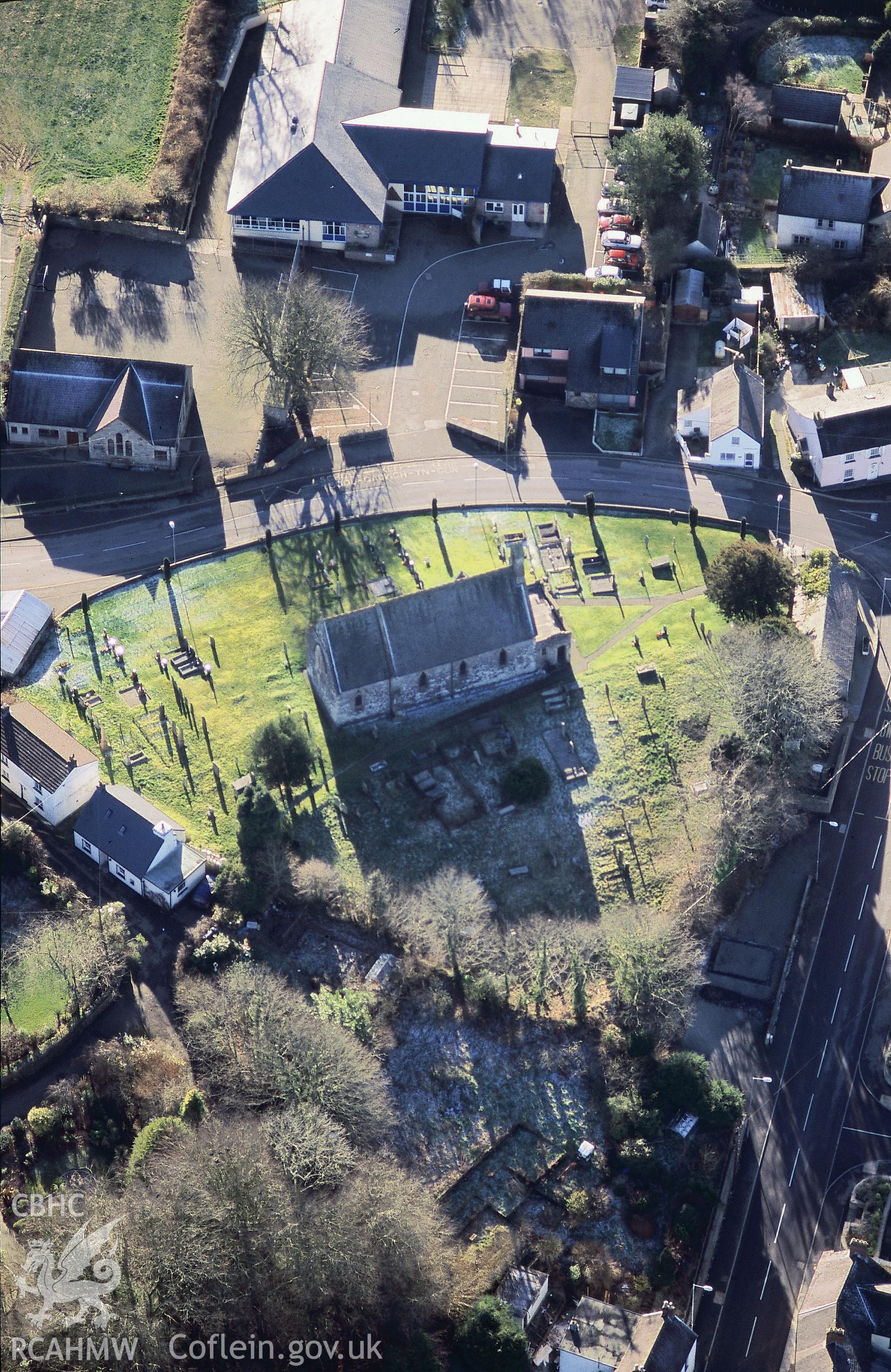 Slide of RCAHMW colour oblique aerial photograph of St Christiolus' Church, Eglwyswrw, taken by Toby Driver, 2004.