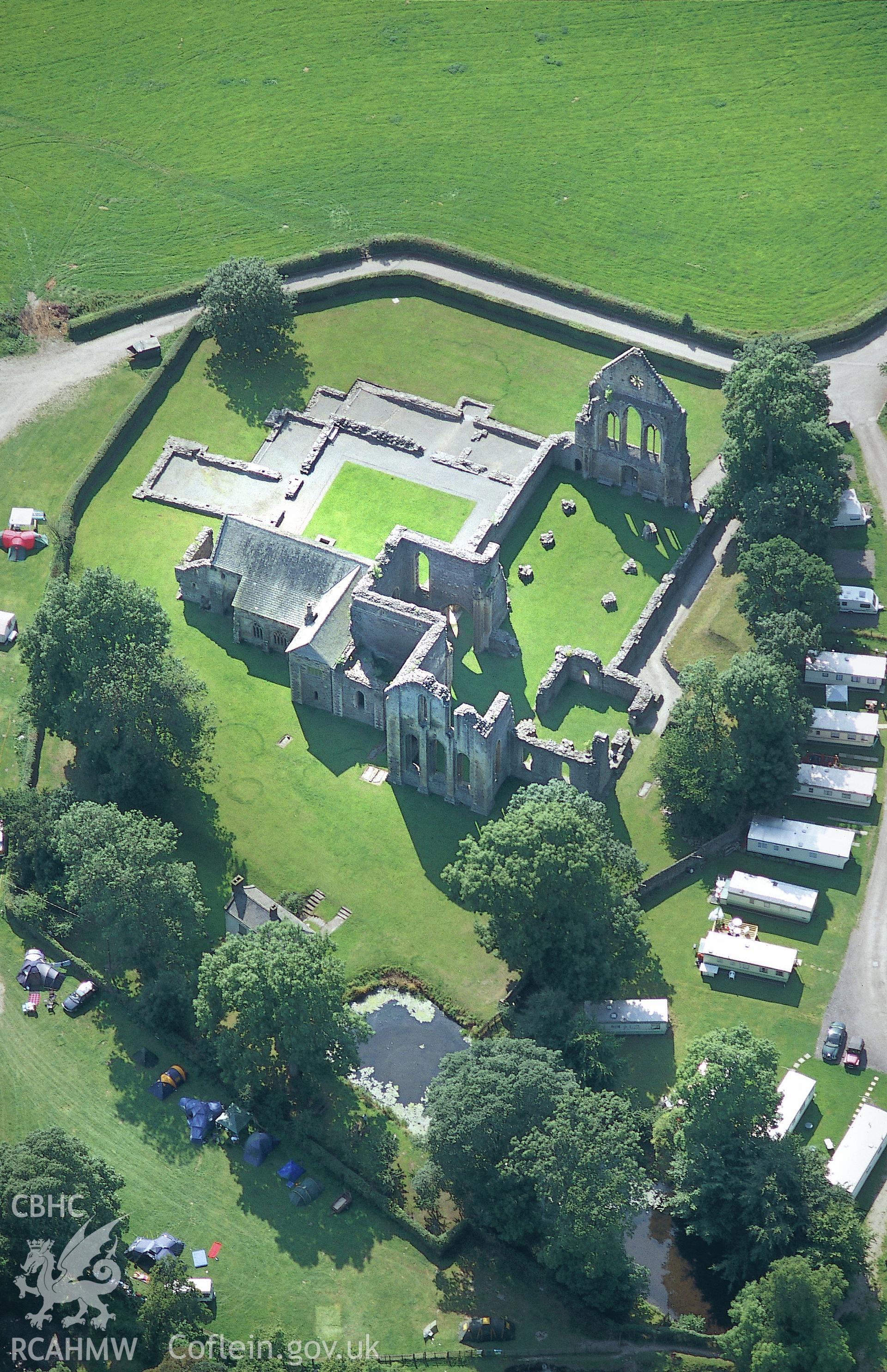 Slide of RCAHMW colour oblique aerial photograph of Valle Crucis Abbey, taken by Toby Driver, 2004.