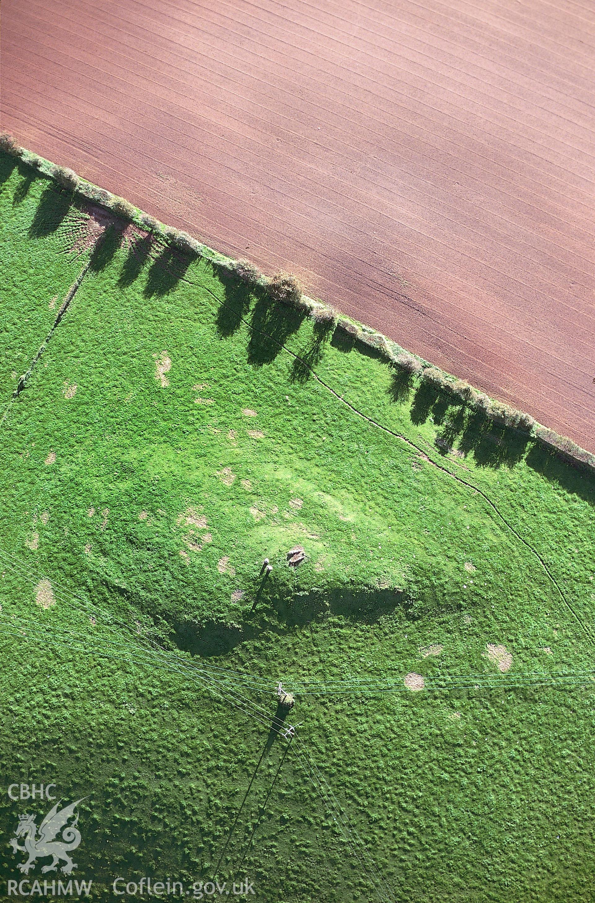 RCAHMW colour slide oblique aerial photograph of Heston Brake Chambered tomb, Portskewett, taken on 18/10/1999 by Toby Driver