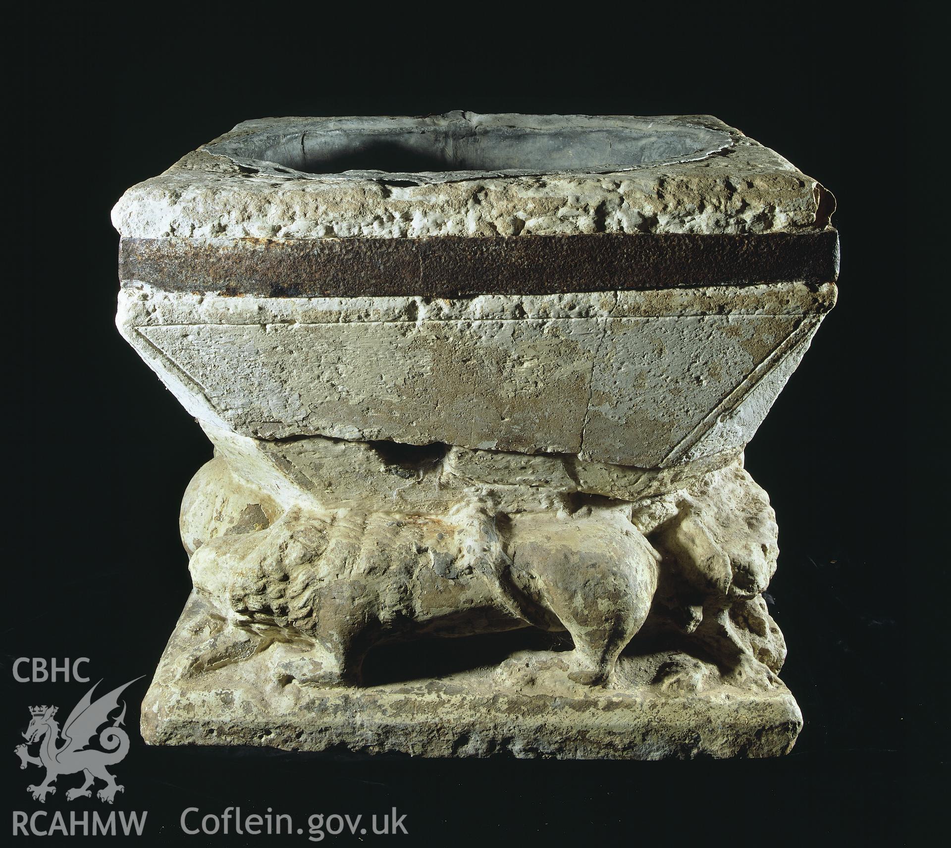 RCAHMW colour transparency showing view of the font at St David's Church, Llanarth.