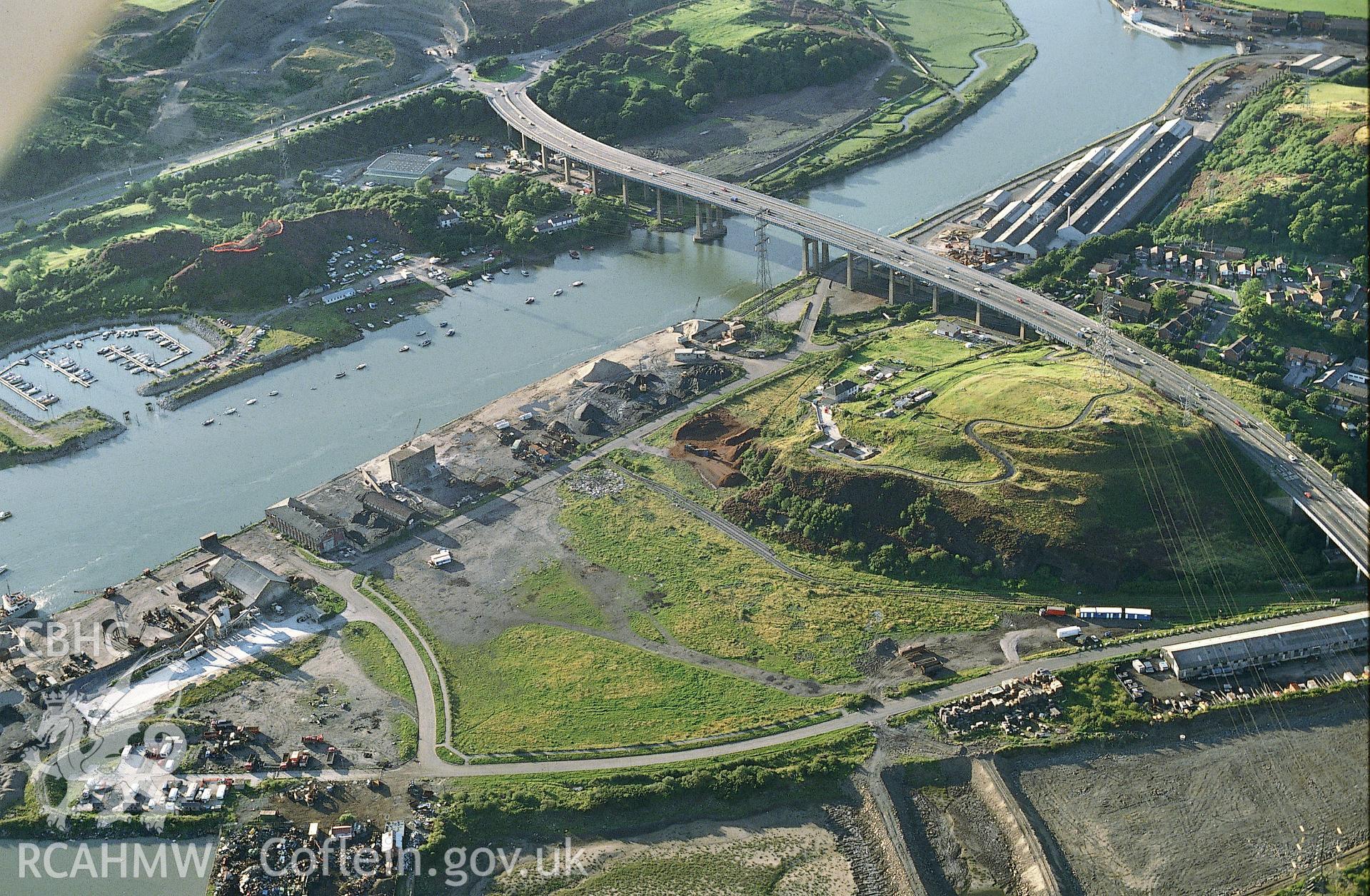 RCAHMW colour slide oblique aerial photograph of Warren Hill Enclosure, Briton Ferry, taken on 25/08/1991 by CR Musson