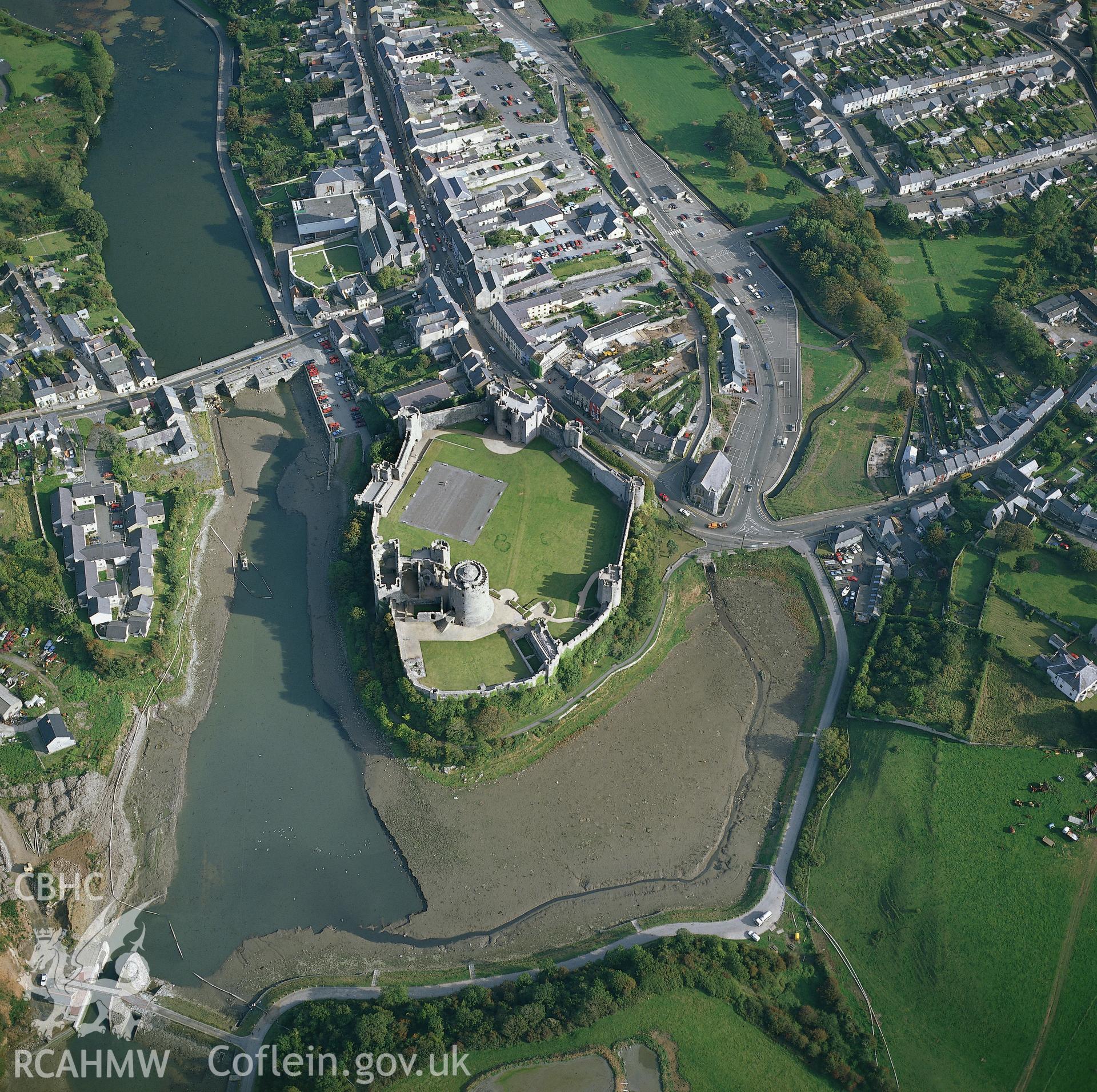 RCAHMW colour oblique aerial photograph of Pembroke Castle. Taken by C R Musson 1990.