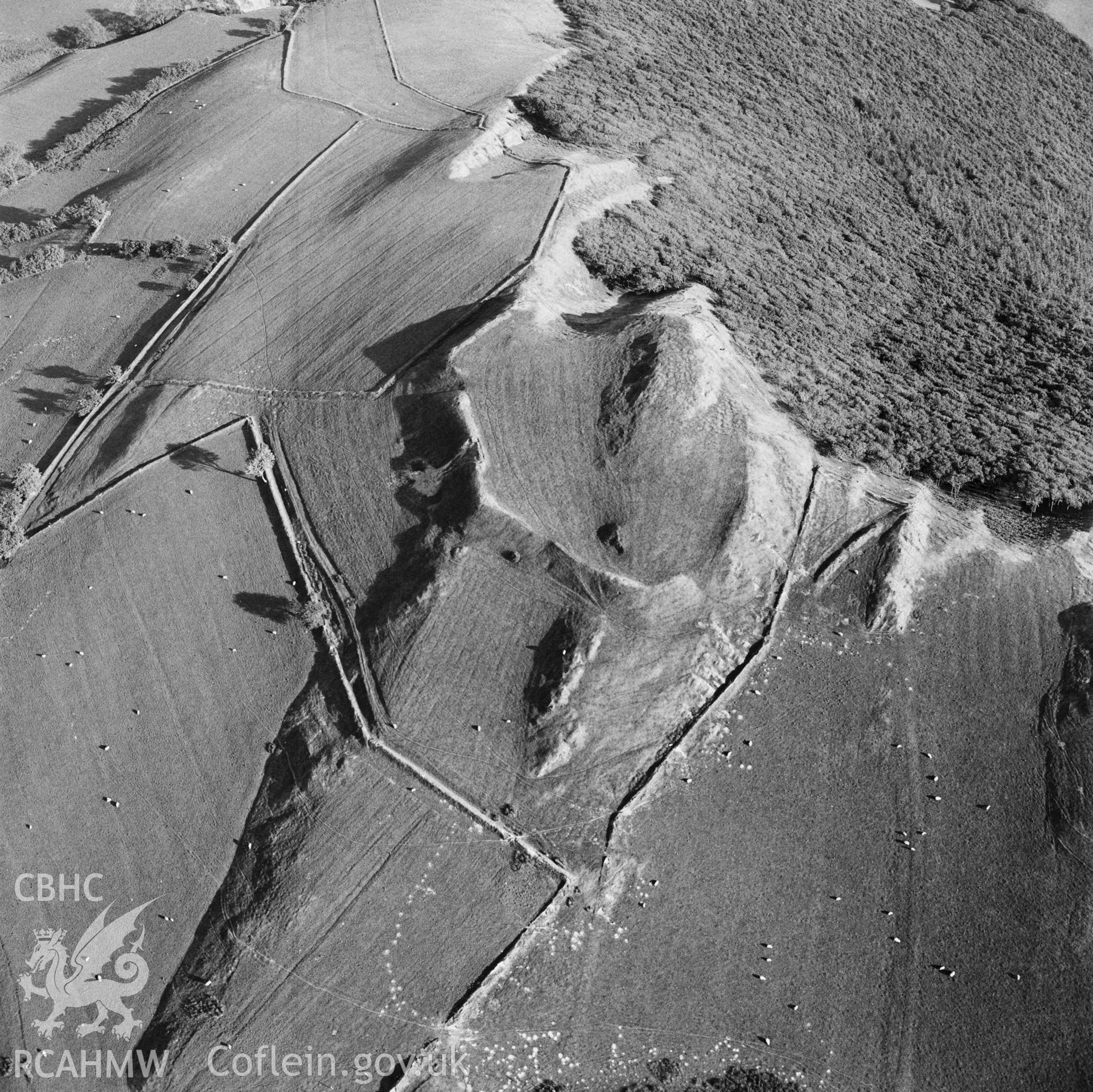 RCAHMW black and white oblique aerial photograph of Castell Bwa-drain, taken 1988.