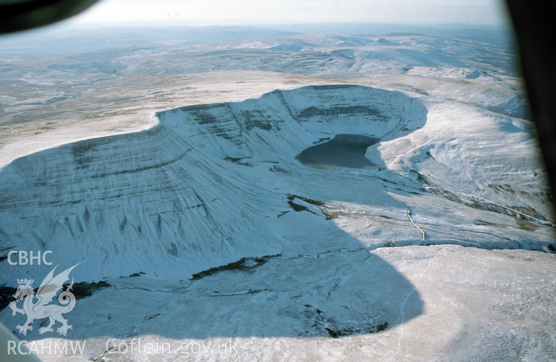 Winter landscape view of Bannau Sir Gaer and Llyn y Fan Fach from the east. RCAHMW colour oblique aerial photograph taken by Toby Driver on 10/01/2003