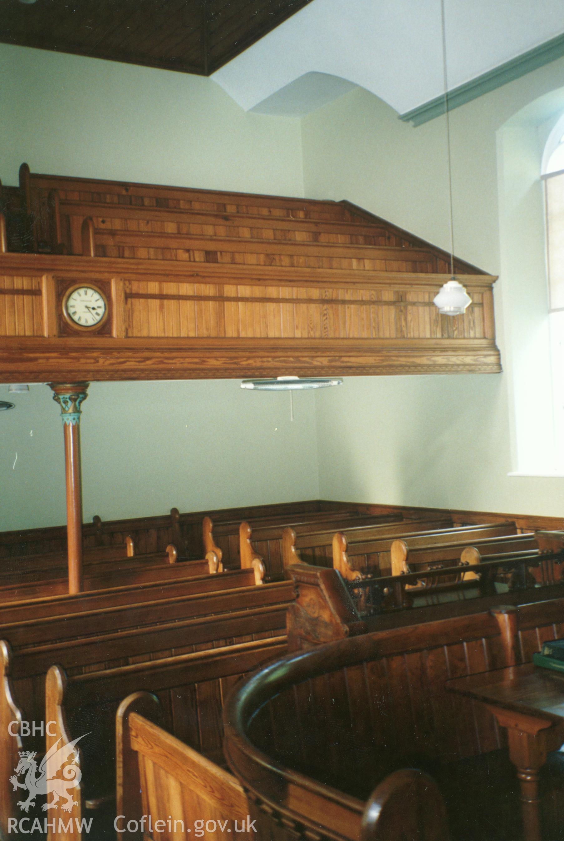 Digital copy of a colour photograph showing an interior view of Llwyndafydd Welsh Baptist Chapel,  taken by Robert Scourfield, c.1996.