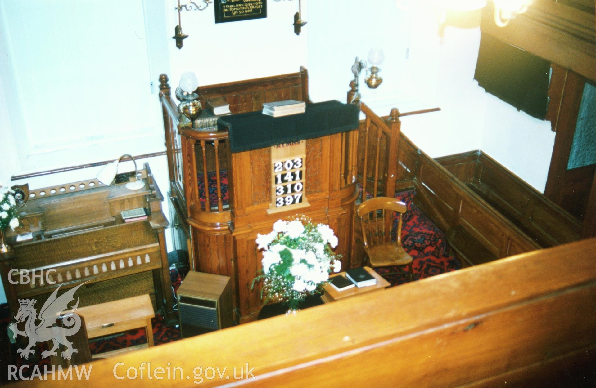 Digital copy of a colour photograph showing an interior view of Cribyn Welsh Unitarian Chapel,  taken by Robert Scourfield, c.1996.