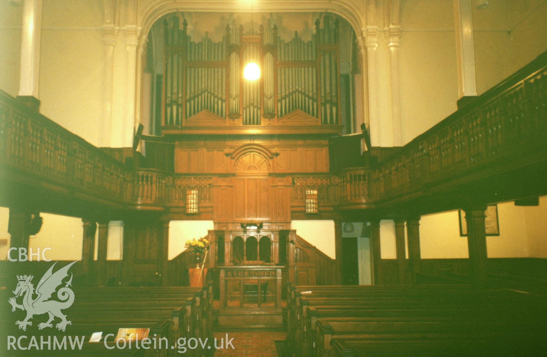 Digital copy of a colour photograph showing an interior view of the Penuel Welsh Baptist Chapel, Carmarthen, taken by Robert Scourfield, c.1996.
