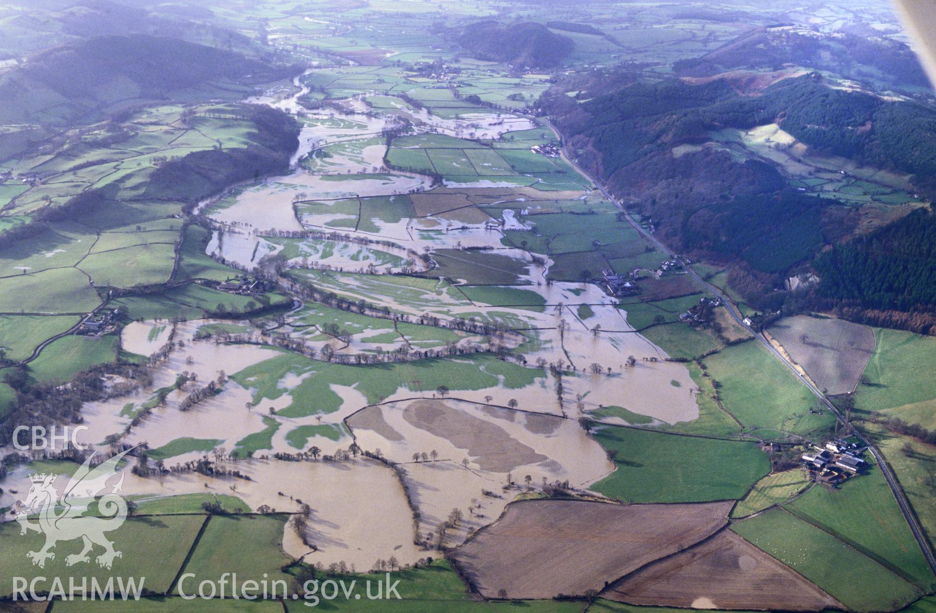 RCAHMW colour slide oblique aerial photograph of the village, Meifod, taken by C.R. Musson, 23/01/94