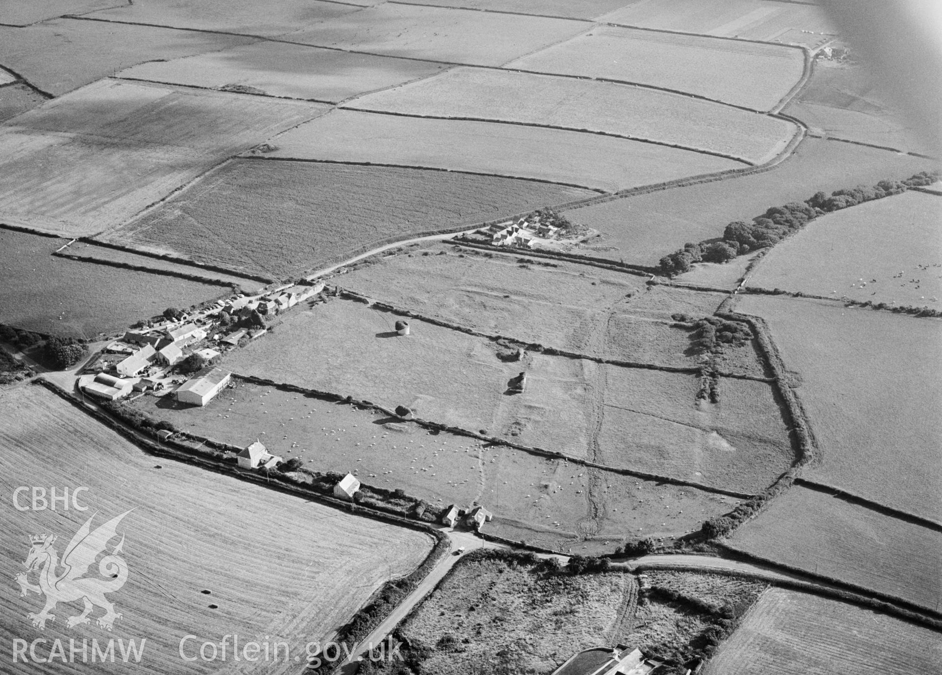 RCAHMW Black and white oblique aerial photograph of Monknash Grange, taken on 07/07/1992 by CR Musson