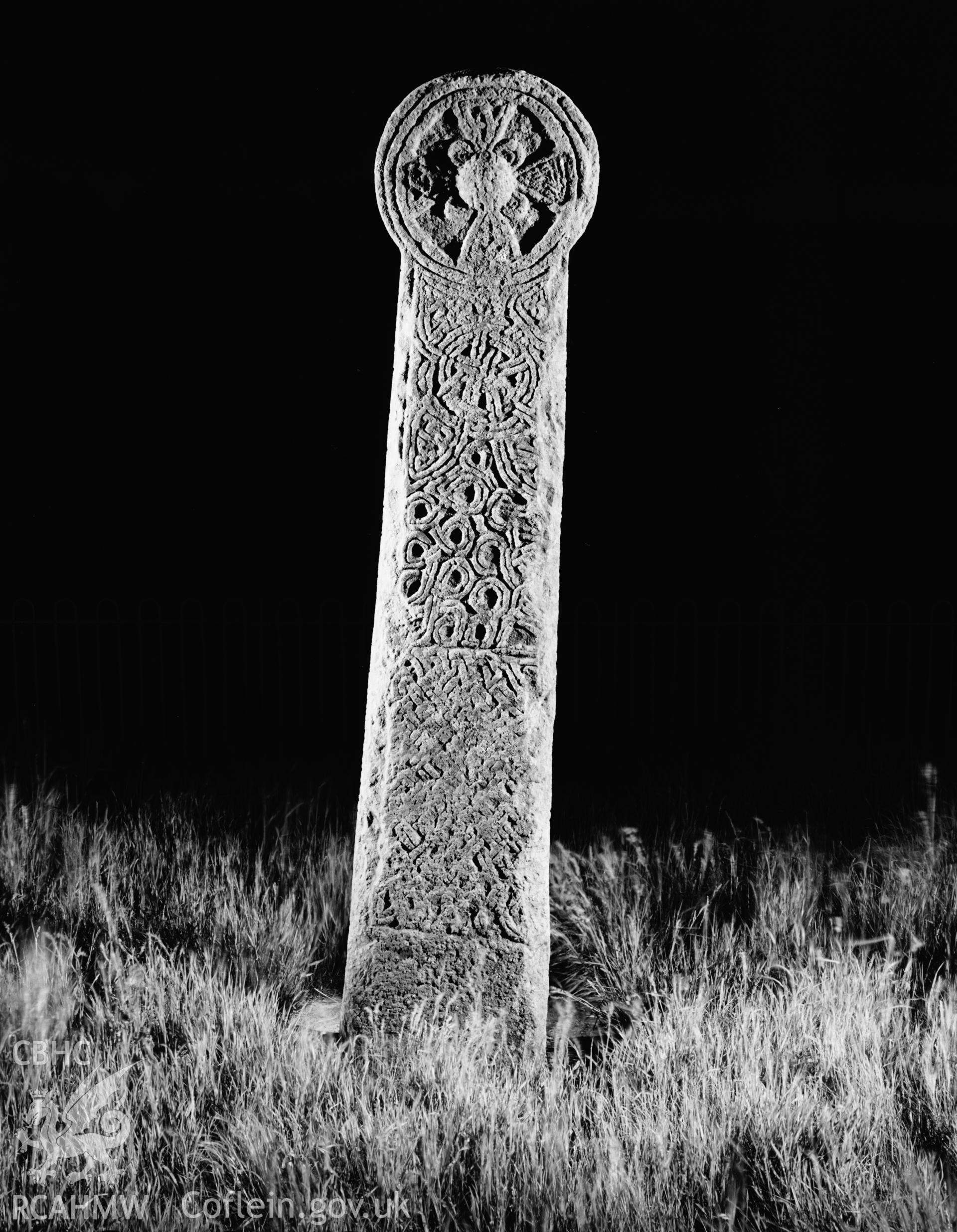 Cross on dark ground.  (portrait)