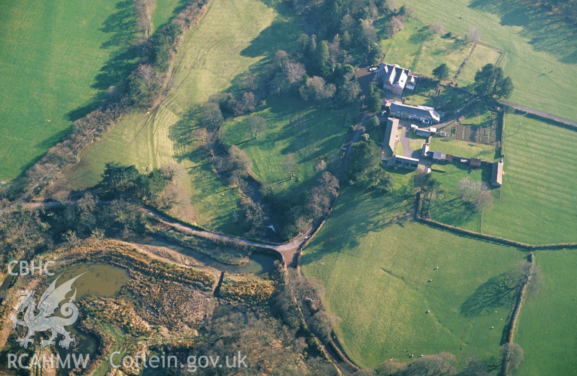 RCAHMW colour slide oblique aerial photograph of the Afon Clydach Dam at Neath Abbey Ironworks, Blaenhonddan, taken on 25/03/1991 by CR Musson