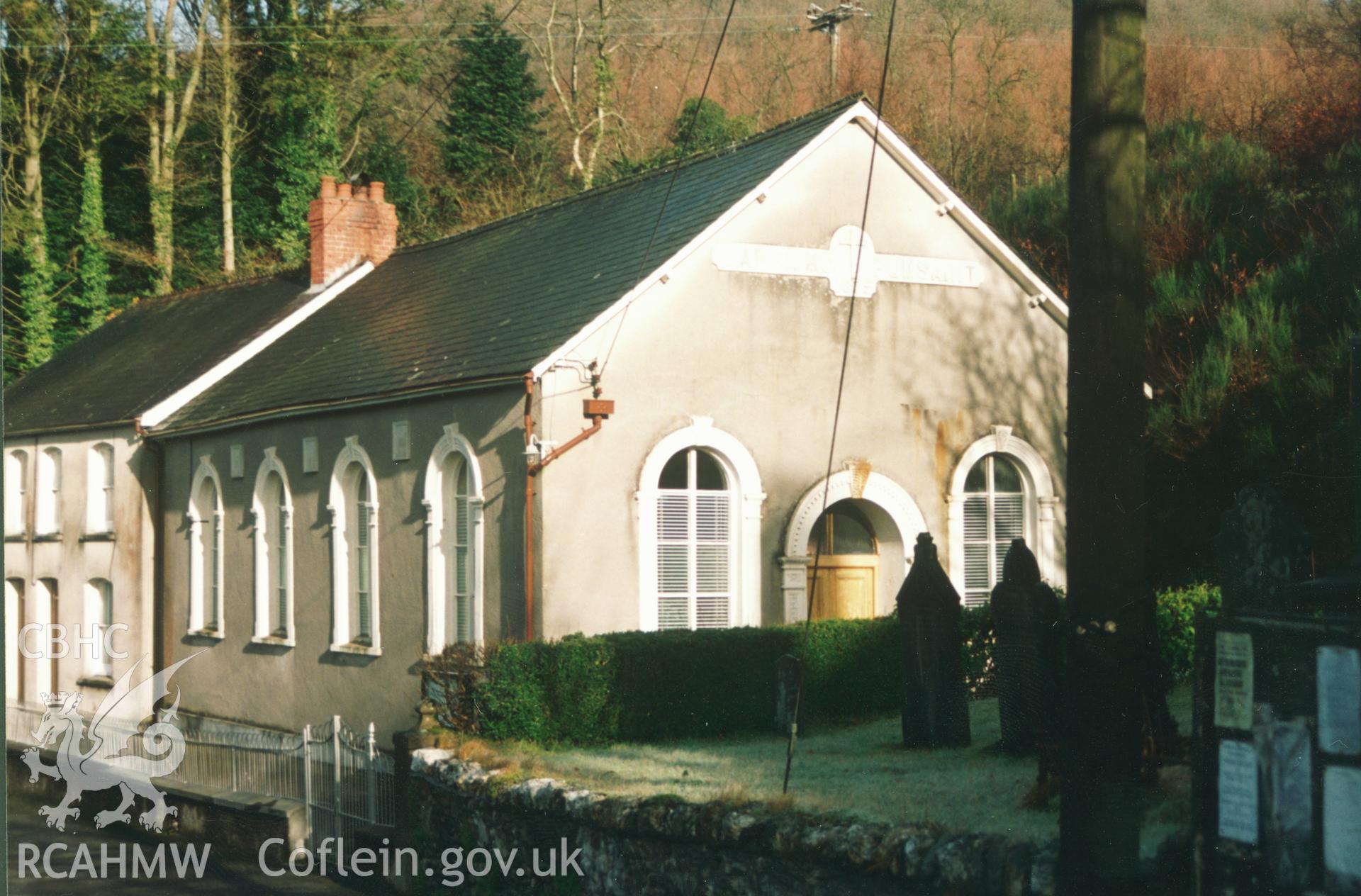 Digital copy of a colour photograph showing an exterior view of Pumpsaint Welsh Calvinistic Methodist Chapel, taken by Robert Scourfield, c.1996.