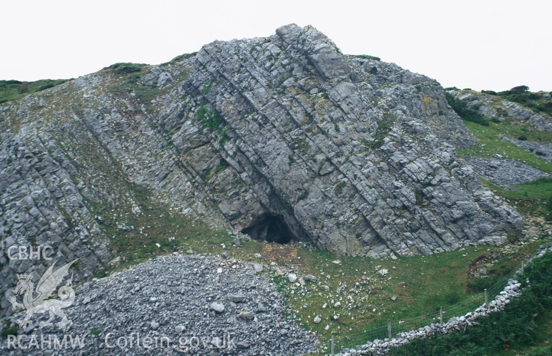 Foxhole Slade Cave, Paviland; colour slide showing the cave entrance from the east, taken by David Leighton, 1997.