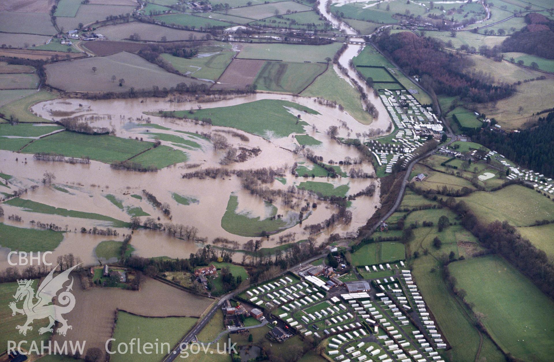 RCAHMW colour slide oblique aerial photograph of Clawdd Coch Roman Military Site, Carreghofa, taken by C.R. Musson, 23/01/94