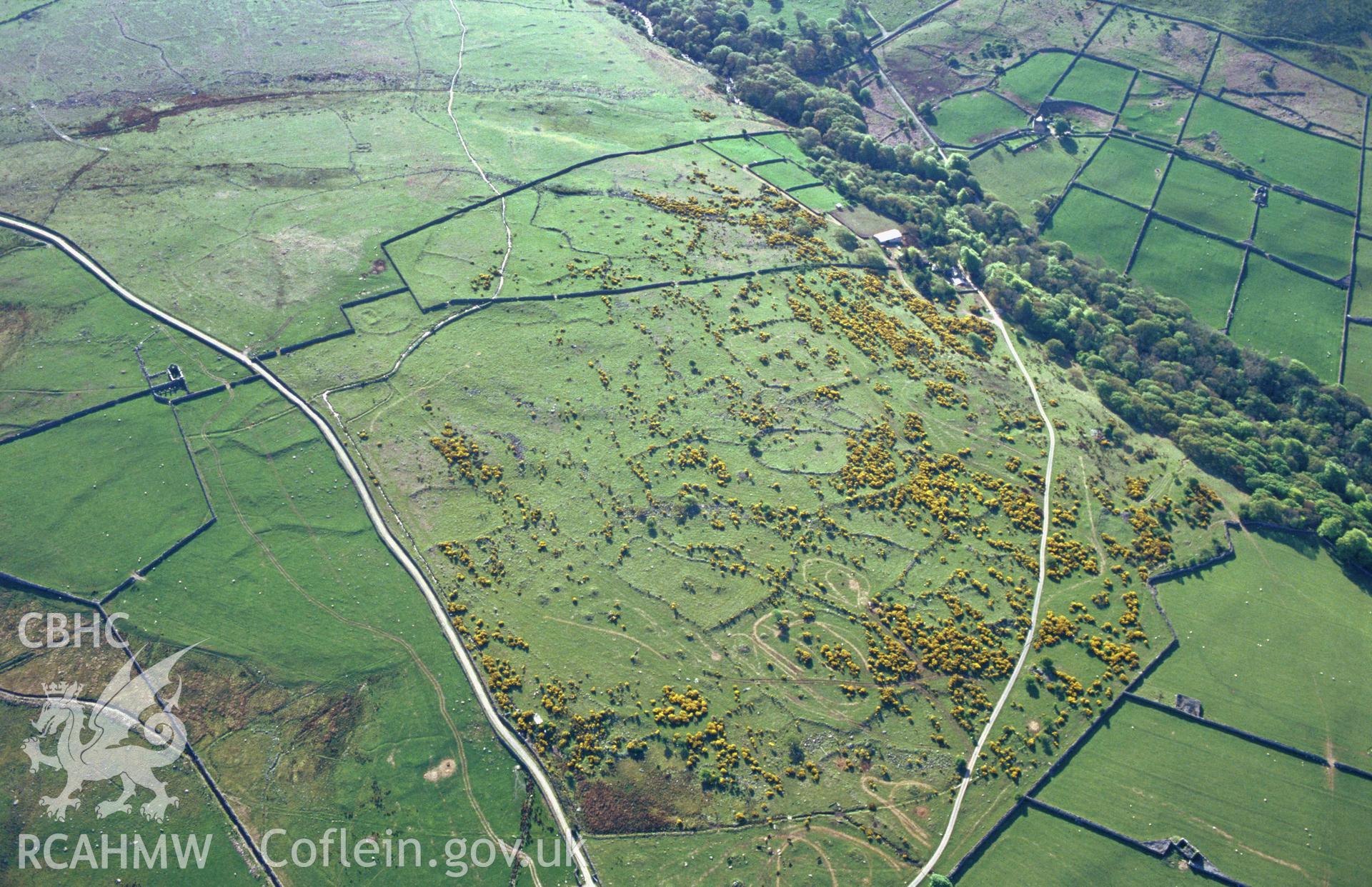 Slide of RCAHMW colour oblique aerial photograph of Cors y Gedol field systemn, taken by C.R. Musson, 1993.