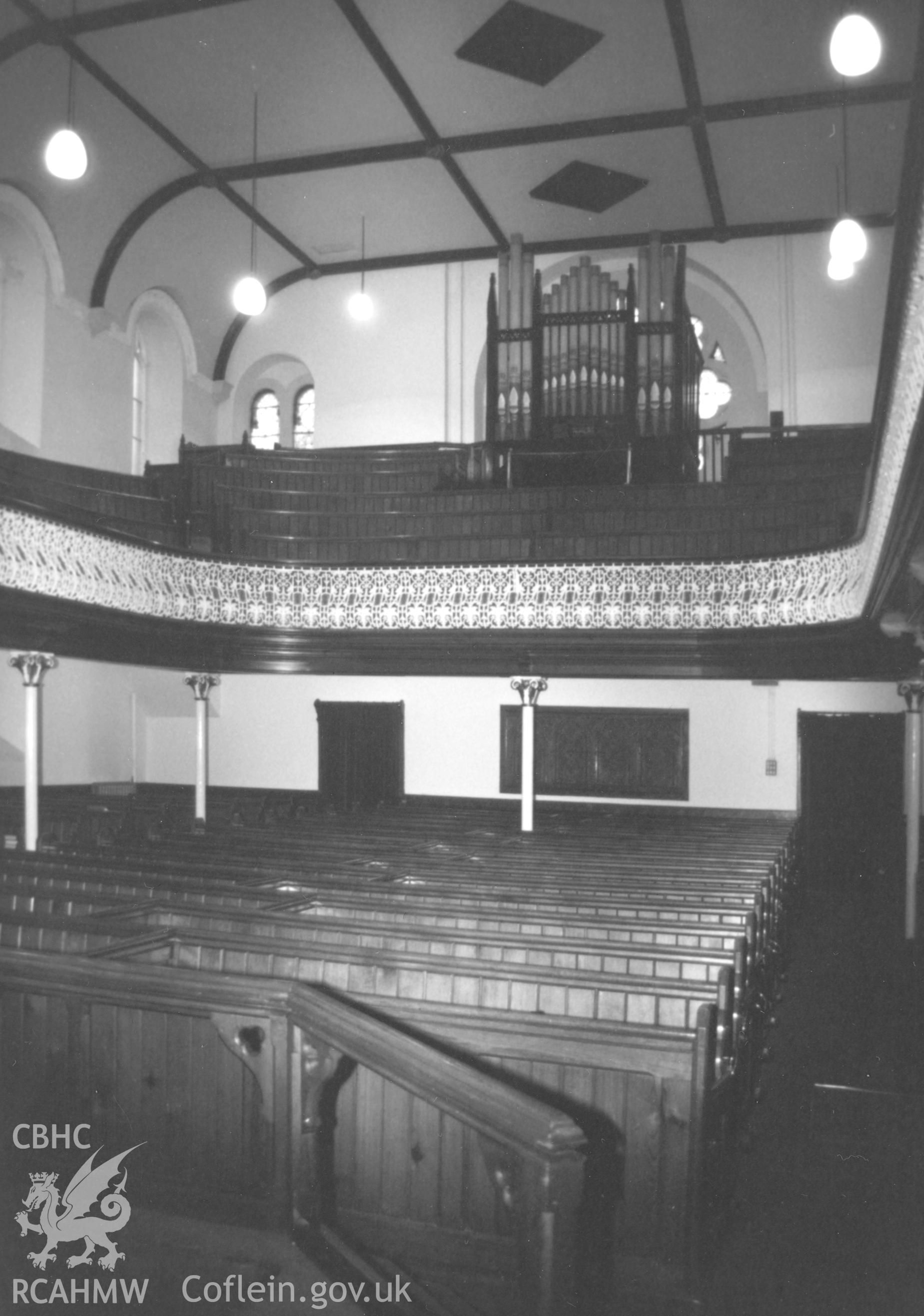 Digital copy of a black and white photograph showing an interior view of the Bethesda English Baptist Chapel, Haverfordwest, taken by Robert Scourfield, c.1996.