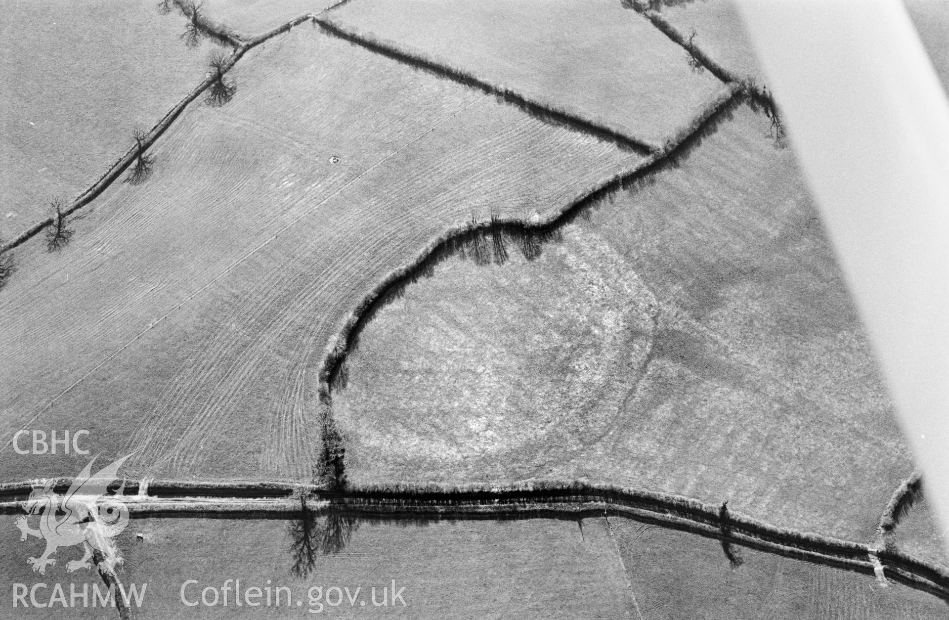 RCAHMW black and white oblique aerial photograph of view of Cwm Bran Camp, 2001.