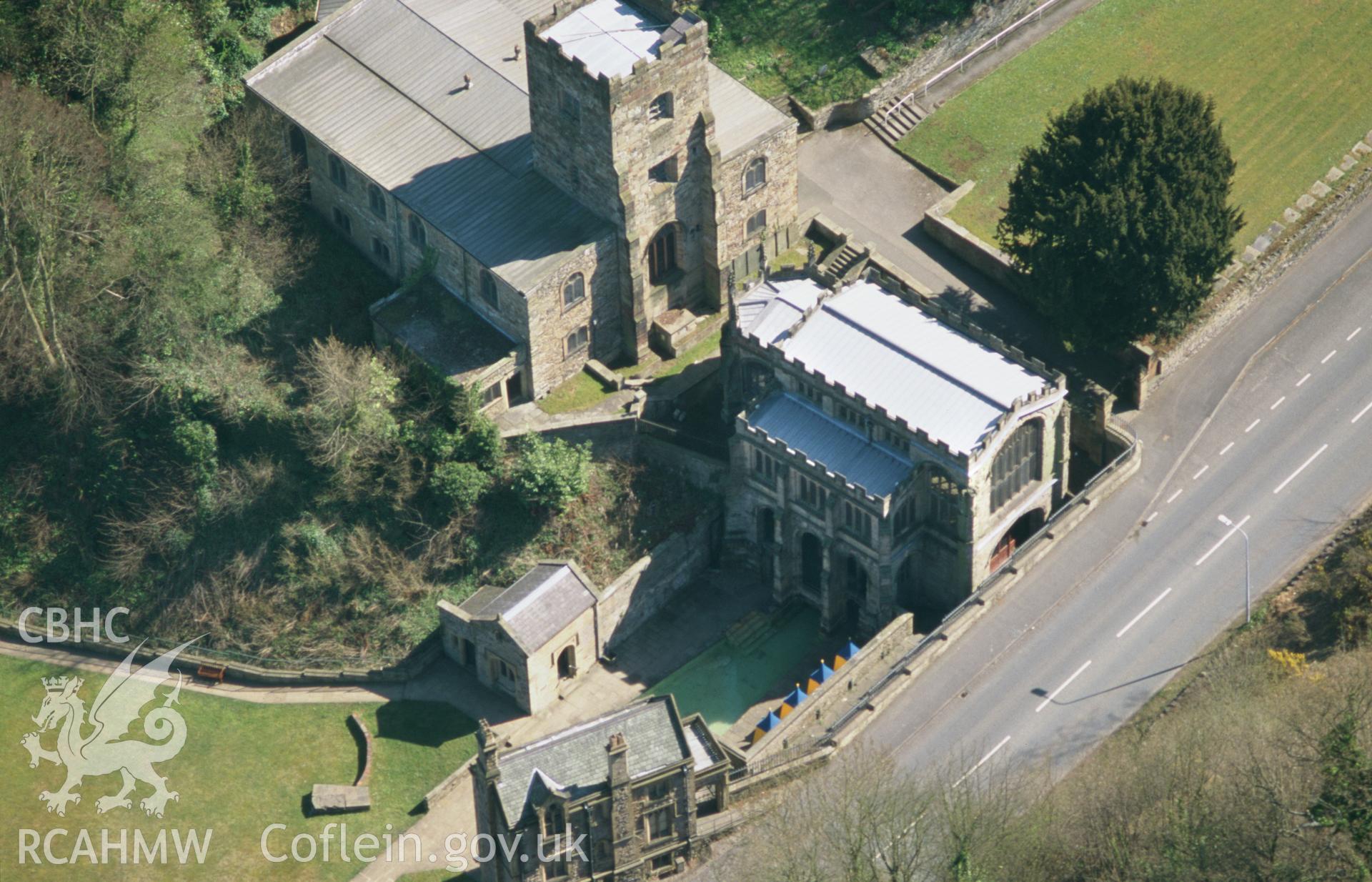 RCAHMW colour oblique aerial photograph of St. Winefride's Well and Chapel. Taken by Toby Driver on 08/04/2003