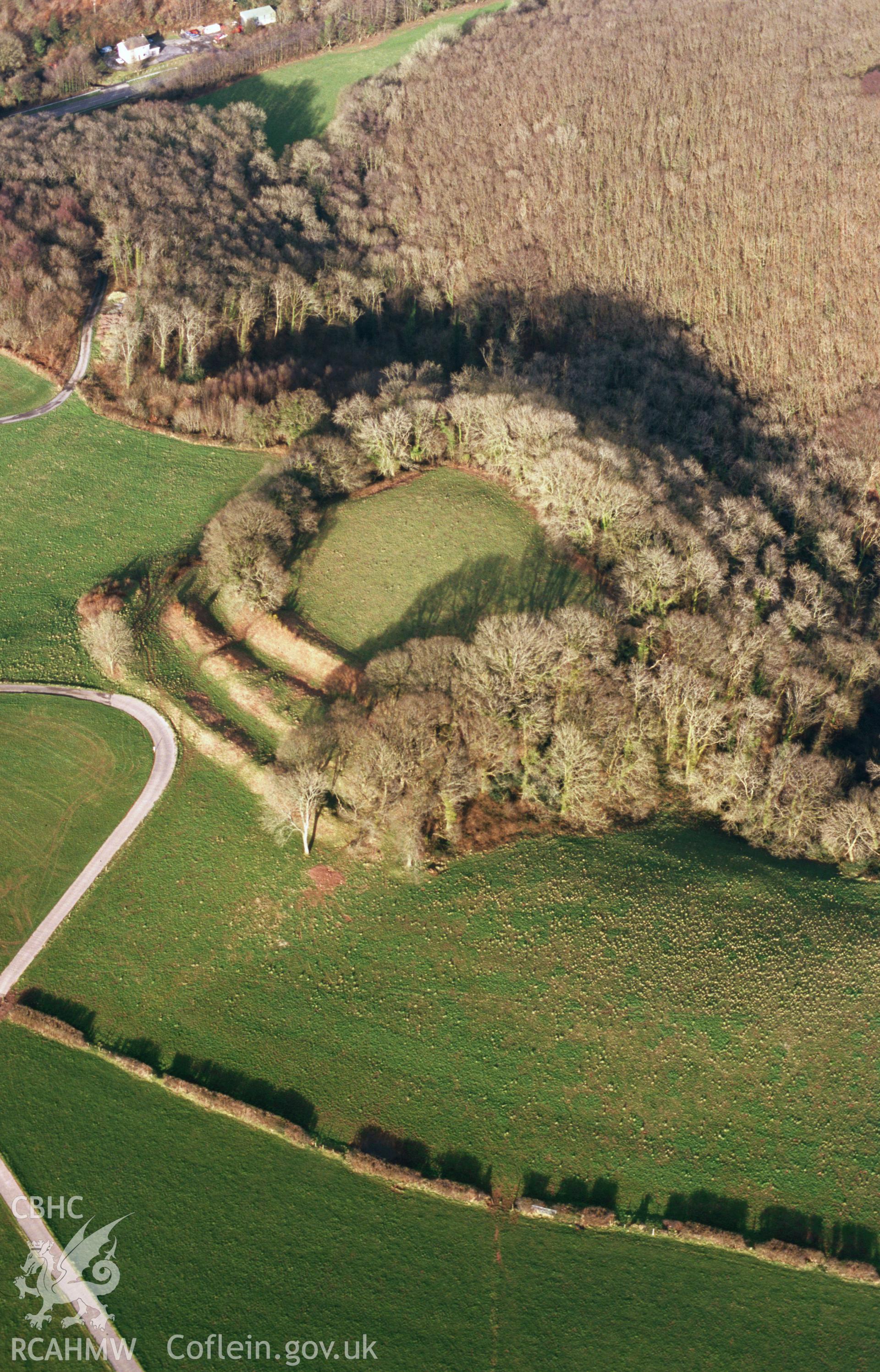 RCAHMW colour slide oblique aerial photograph of Castell Pen-y-Coed, Eglwyscummin, taken by T.G.Driver on the 21/02/2000