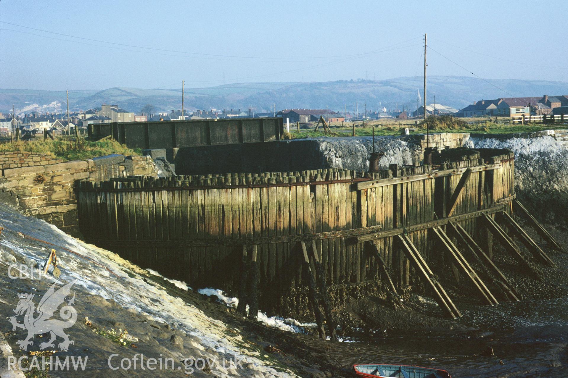 35mm colour slide showing coffer dam at Burry Port Harbour, by Dylan Roberts.