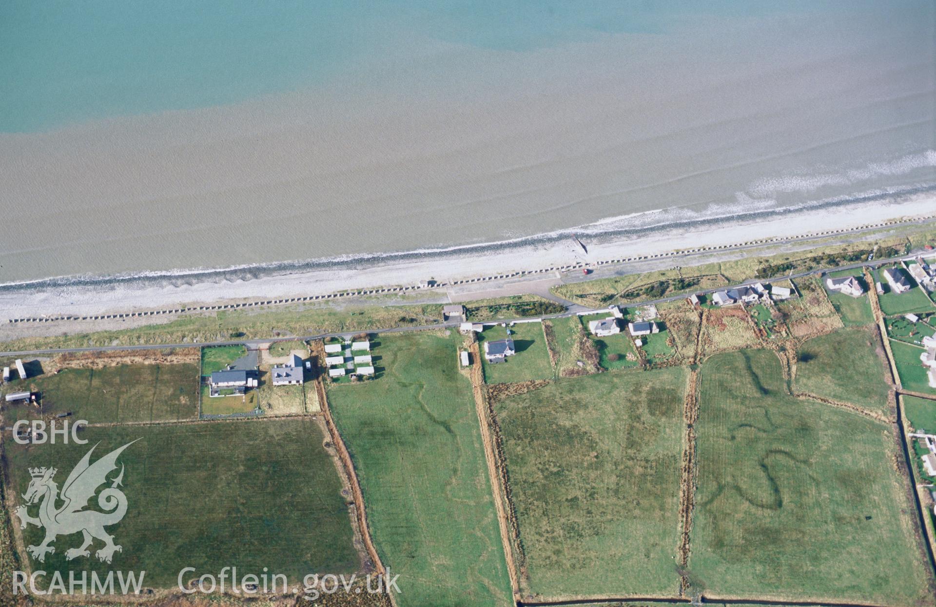 Slide of RCAHMW colour oblique aerial photograph of anti-invasion blocks at Fairbourne, taken by T.G. Driver, 2002.