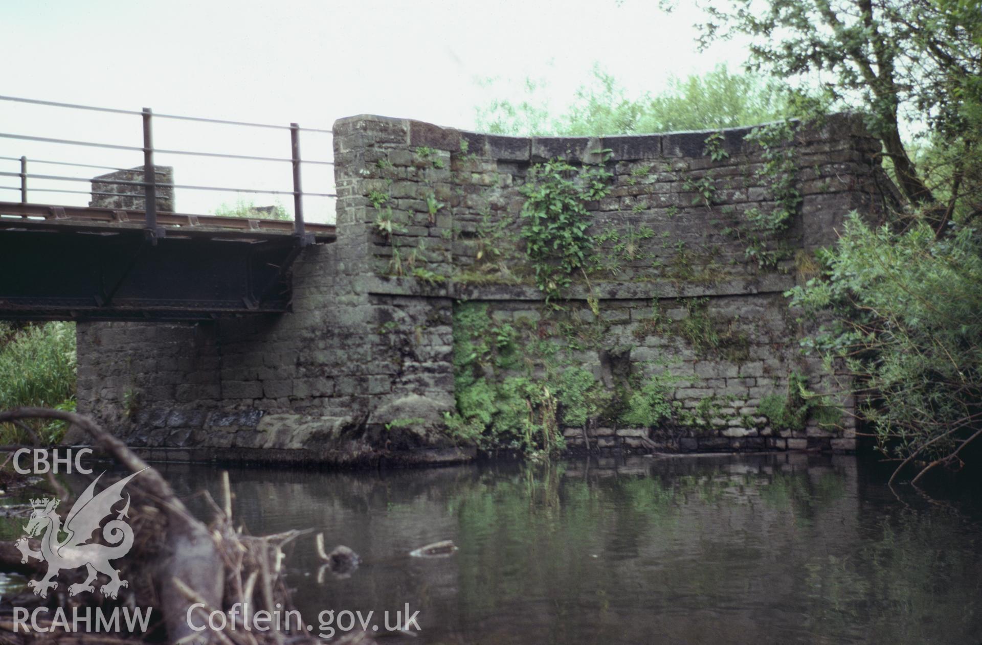 35mm colour slide showing the remains of an unidentified aqueduct on the Kidwelly and  Llanelli Canal, Carmarthenshire by Dylan Roberts, undated.