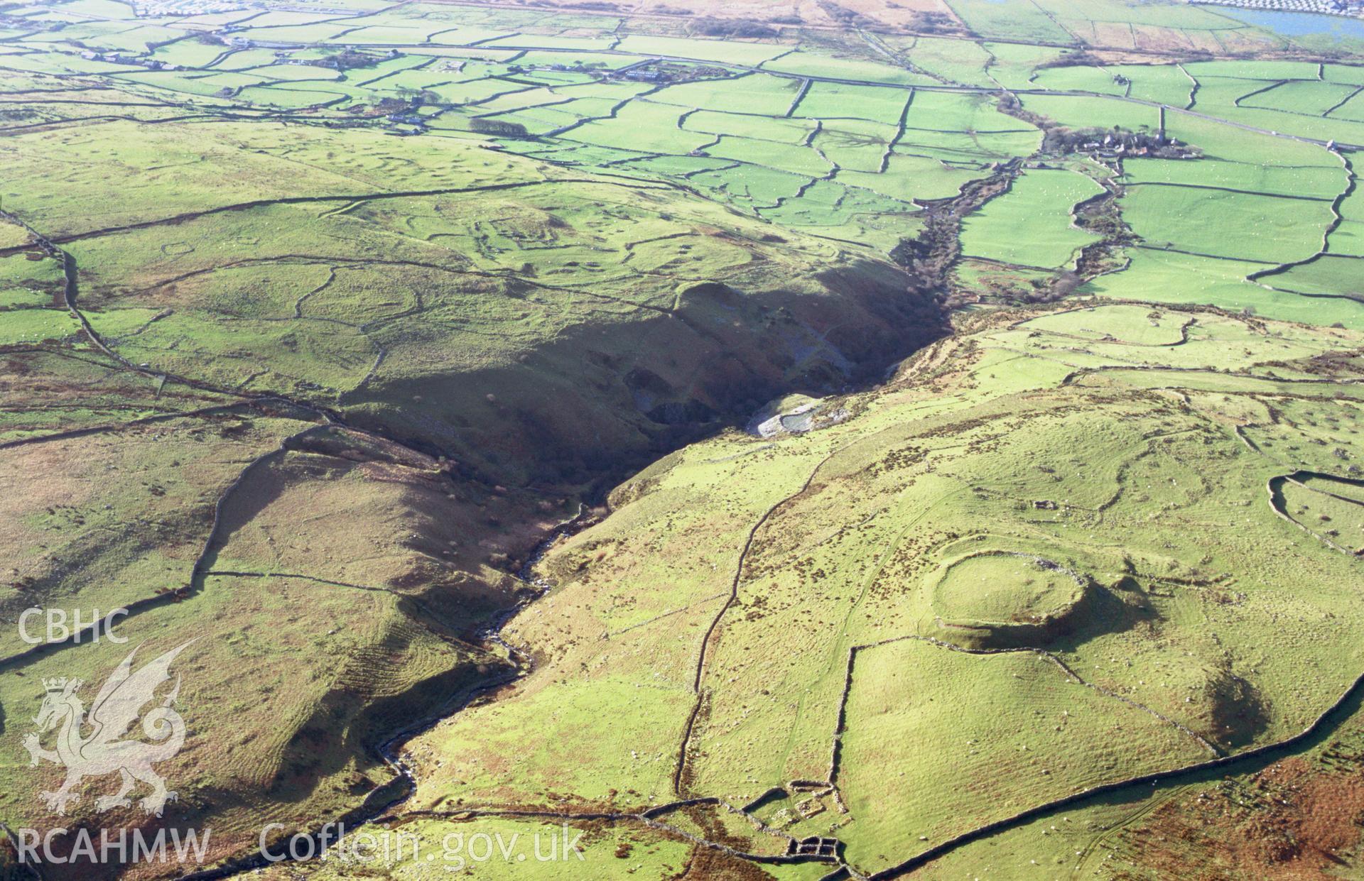 Slide of RCAHMW colour oblique aerial photograph of Pen y Dinas, Dyffryn Ardudwy, taken by T.G. Driver, 2005.