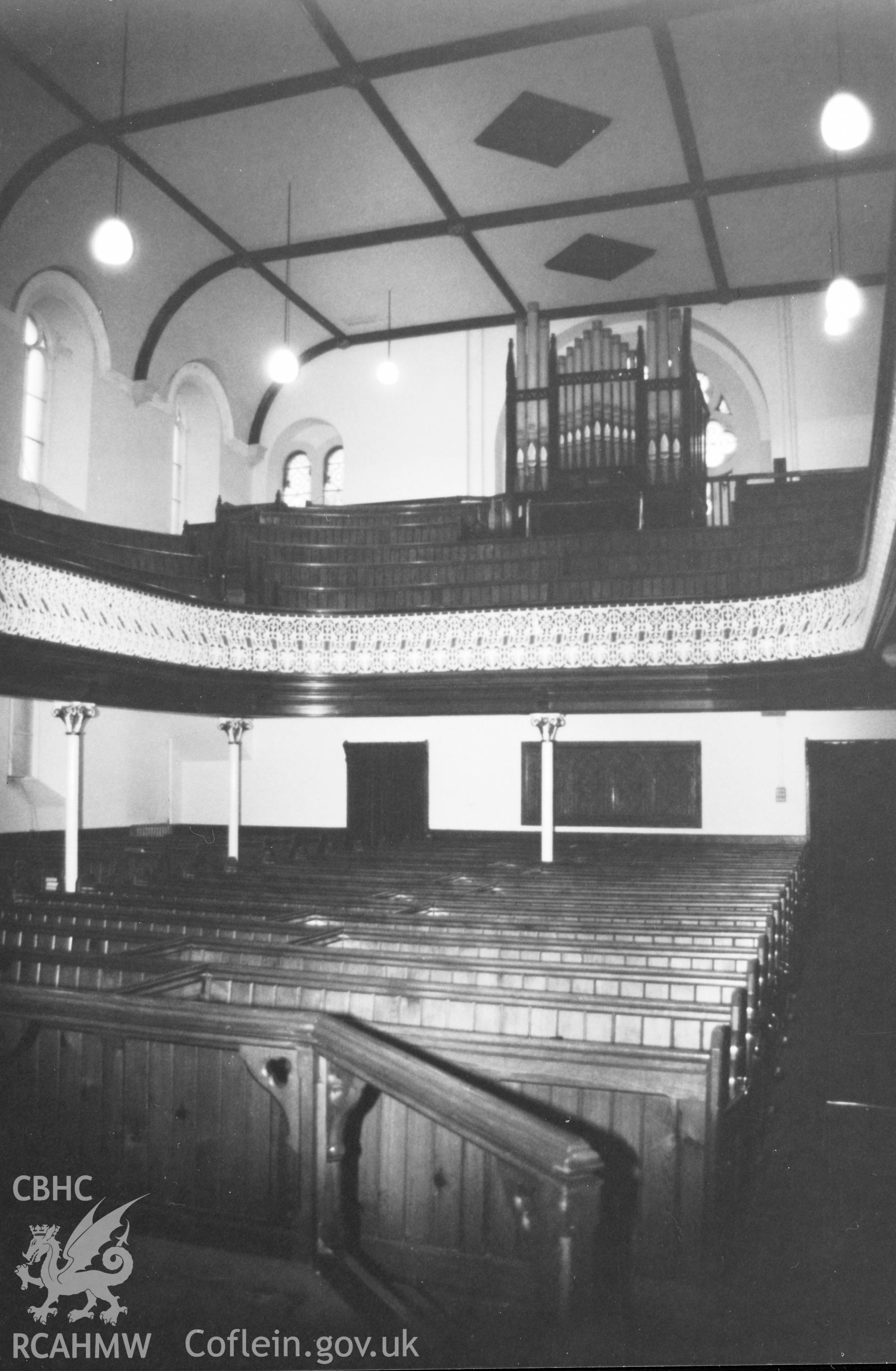 Digital copy of a black and white photograph showing an interior view of Bethesda English Baptist Chapel, Haverfordwest taken by Robert Scourfield, 1996.