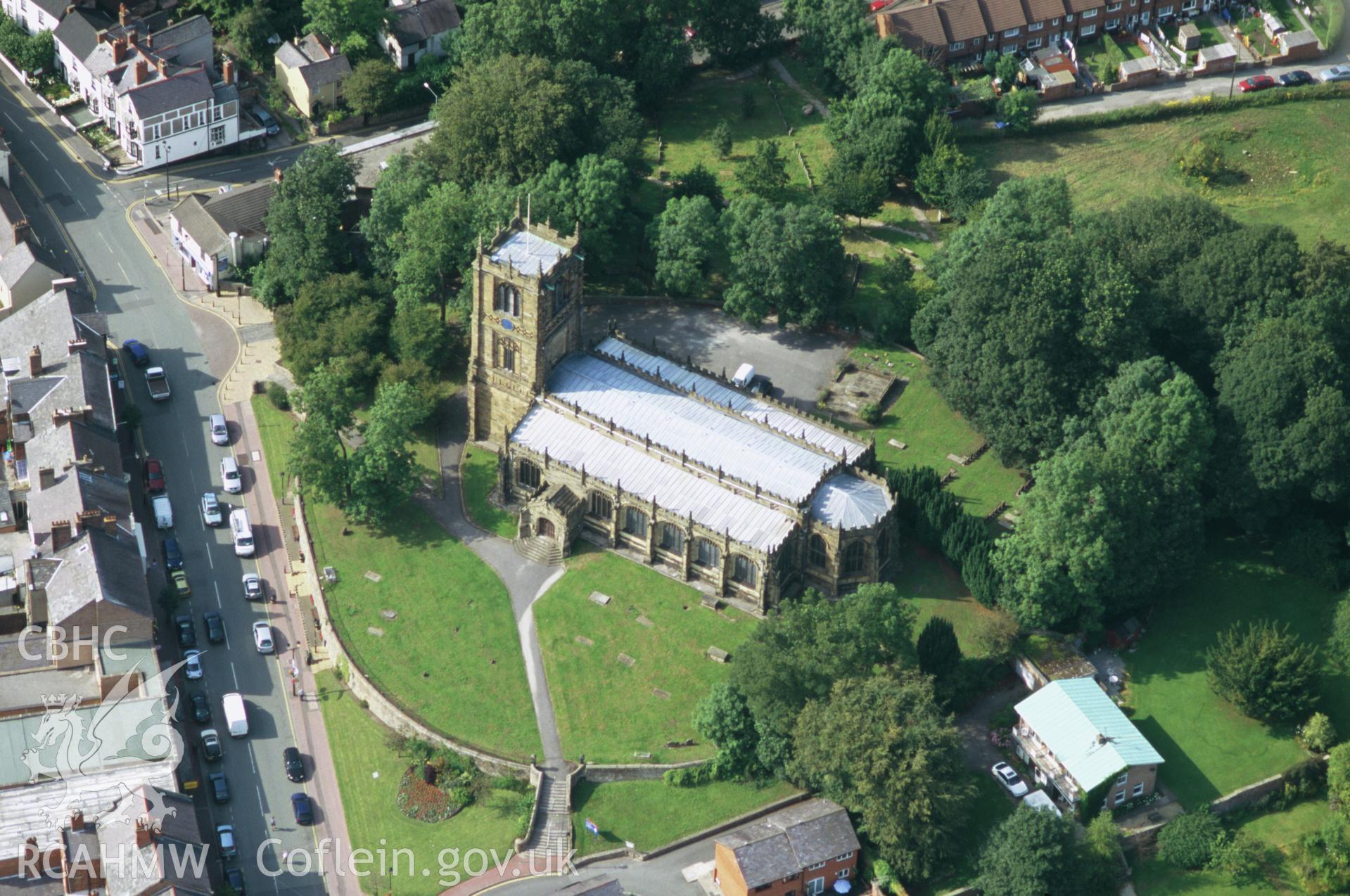 Slide of RCAHMW colour oblique aerial photograph of St Marys Church, Mold, taken by Toby Driver, 2004.