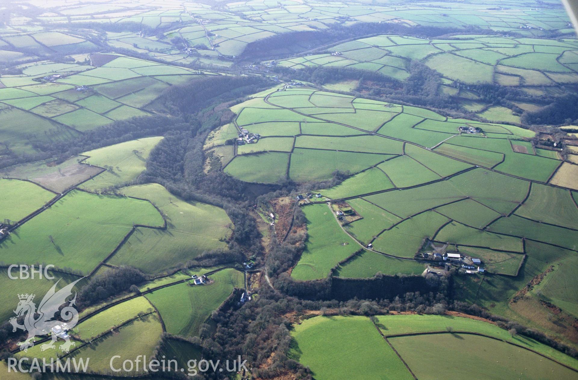 RCAHMW colour slide oblique aerial photograph of Pen-Gaer;  Parc Gaer, Llanboidy, taken by C.R.Musson on the 07/02/1997