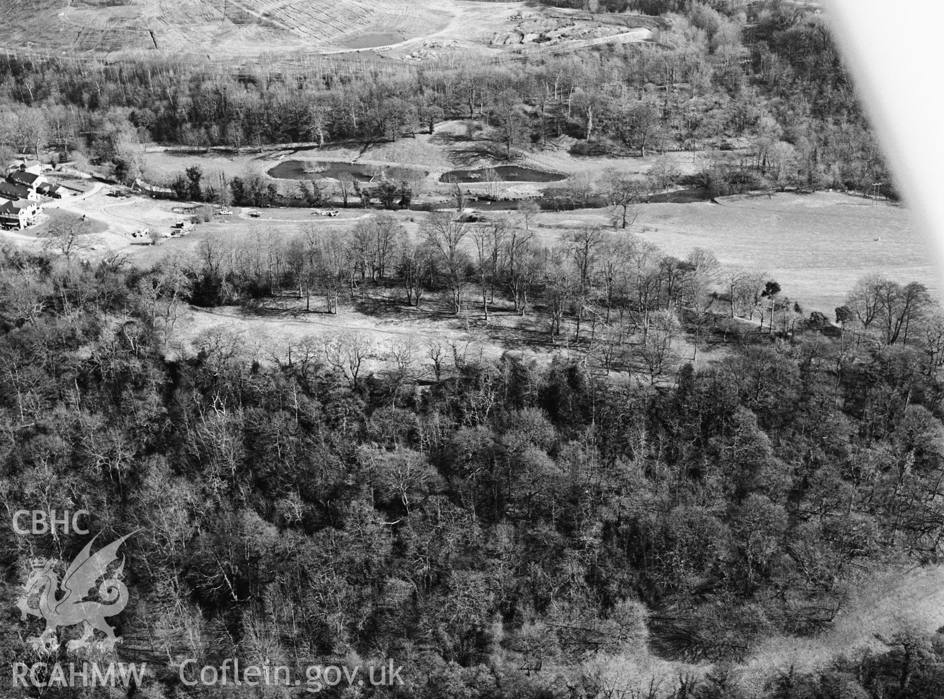 RCAHMW black and white oblique aerial photograph of Bryn Alyn Camp, hillfort. Taken by Toby Driver on 14/03/2003