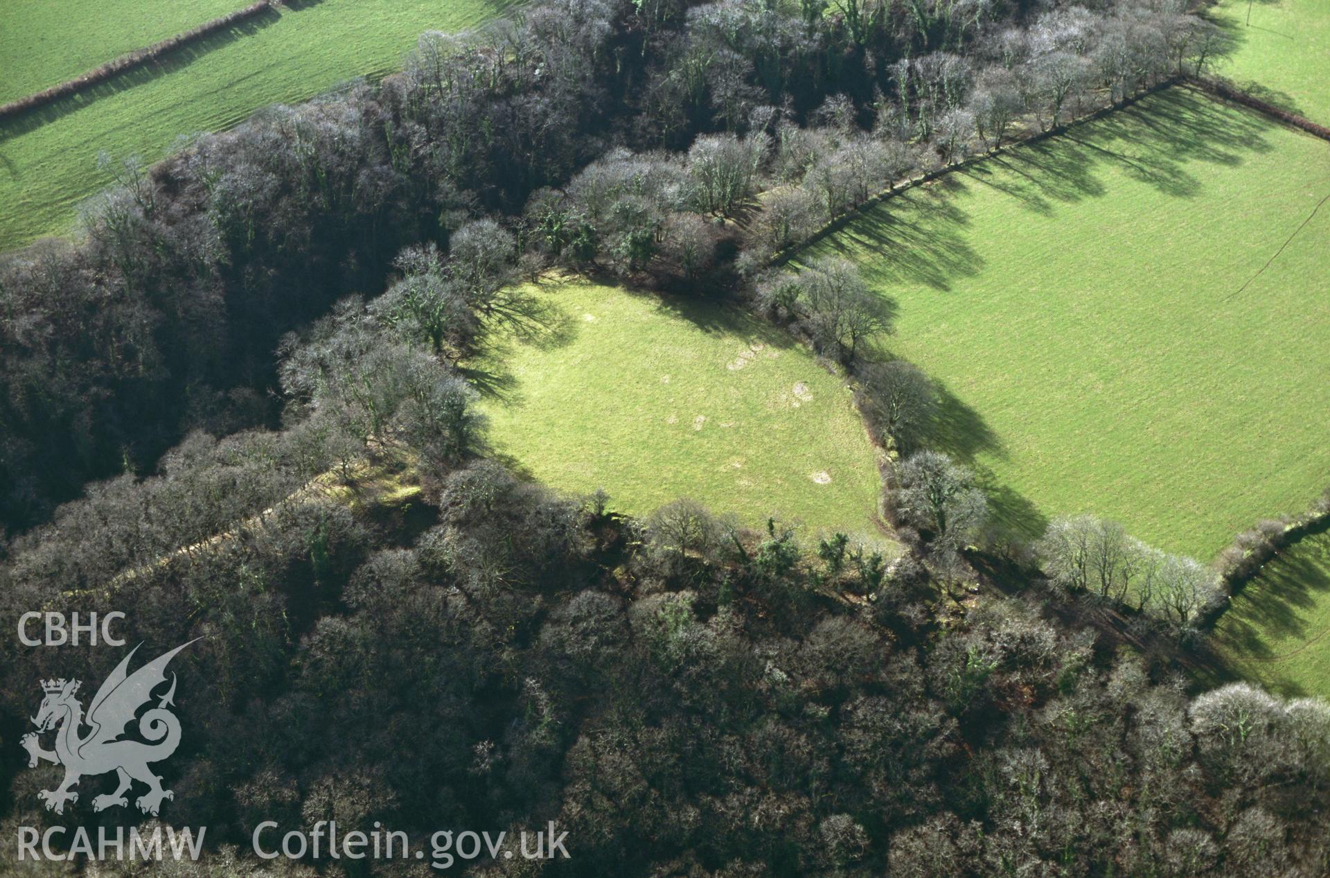 RCAHMW colour slide oblique aerial photograph of Castell Mawr, Llanwinio, taken by C.R.Musson on the 07/02/1997