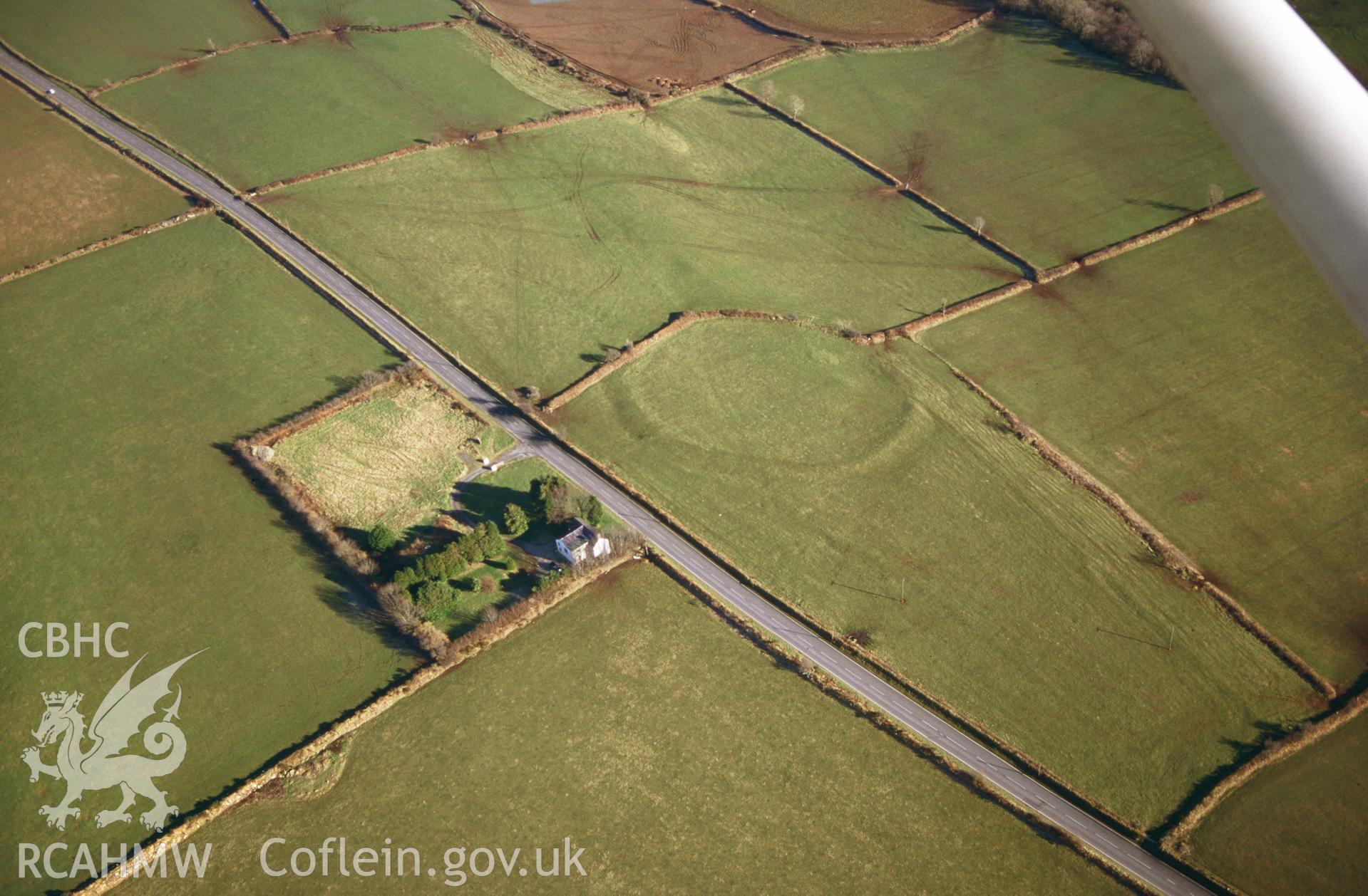 RCAHMW colour slide oblique aerial photograph of Castell Garw, Glandy Cross, Cilymaenllwyd, taken on 27/01/1998 by Toby Driver