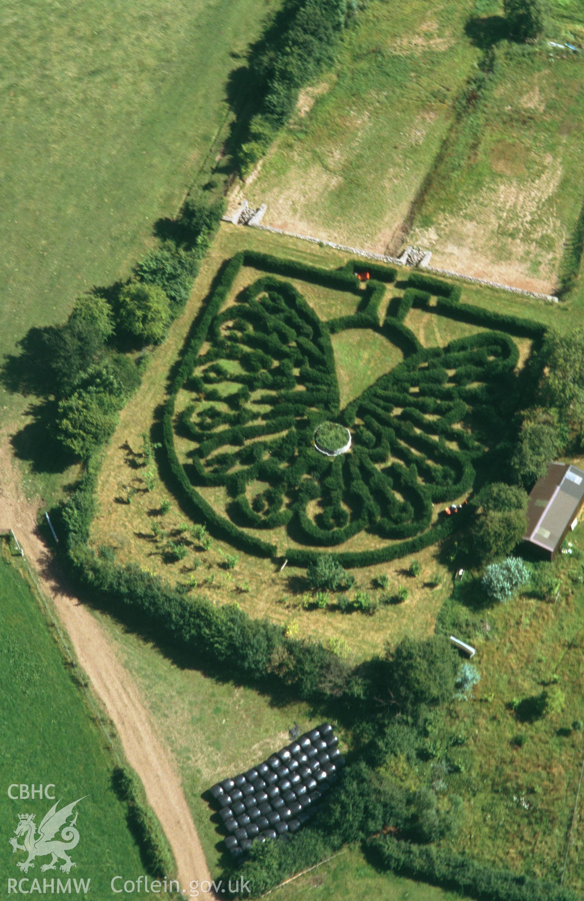 Slide of RCAHMW colour oblique aerial photograph of the gardens at Pen y Clawdd Court taken by Toby Driver, 2003.