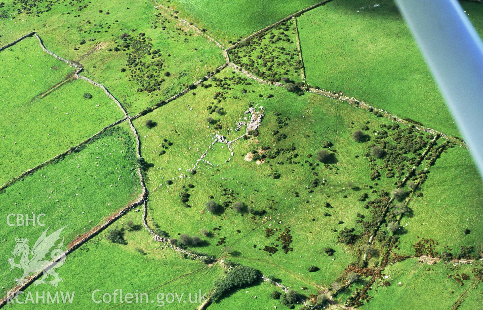 RCAHMW colour oblique aerial photograph of Carn Menyn Enclosures. Taken by Toby Driver on 2002