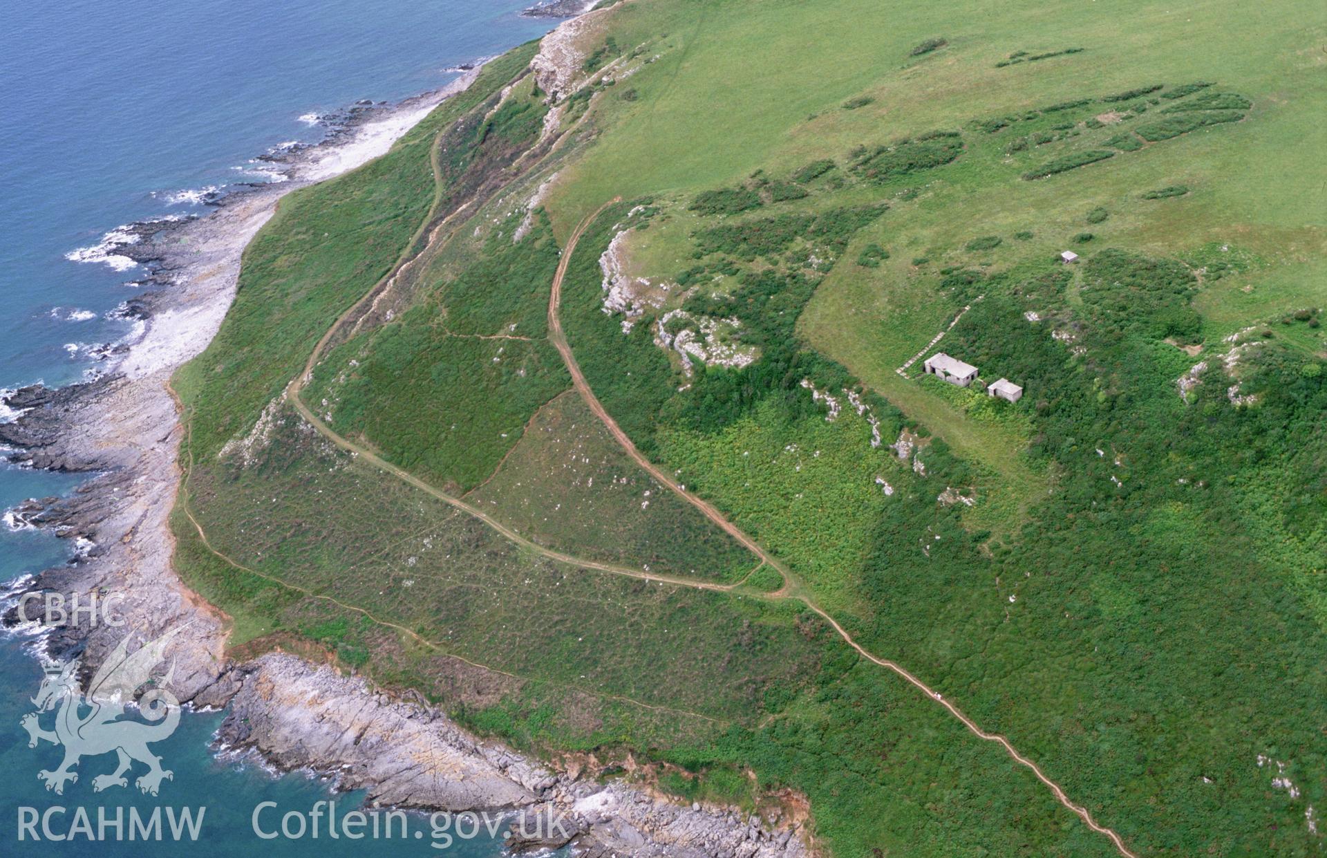 RCAHMW colour oblique aerial photograph of Oxwich Point, chain home low radar site. Taken by Toby Driver on 17/07/2002