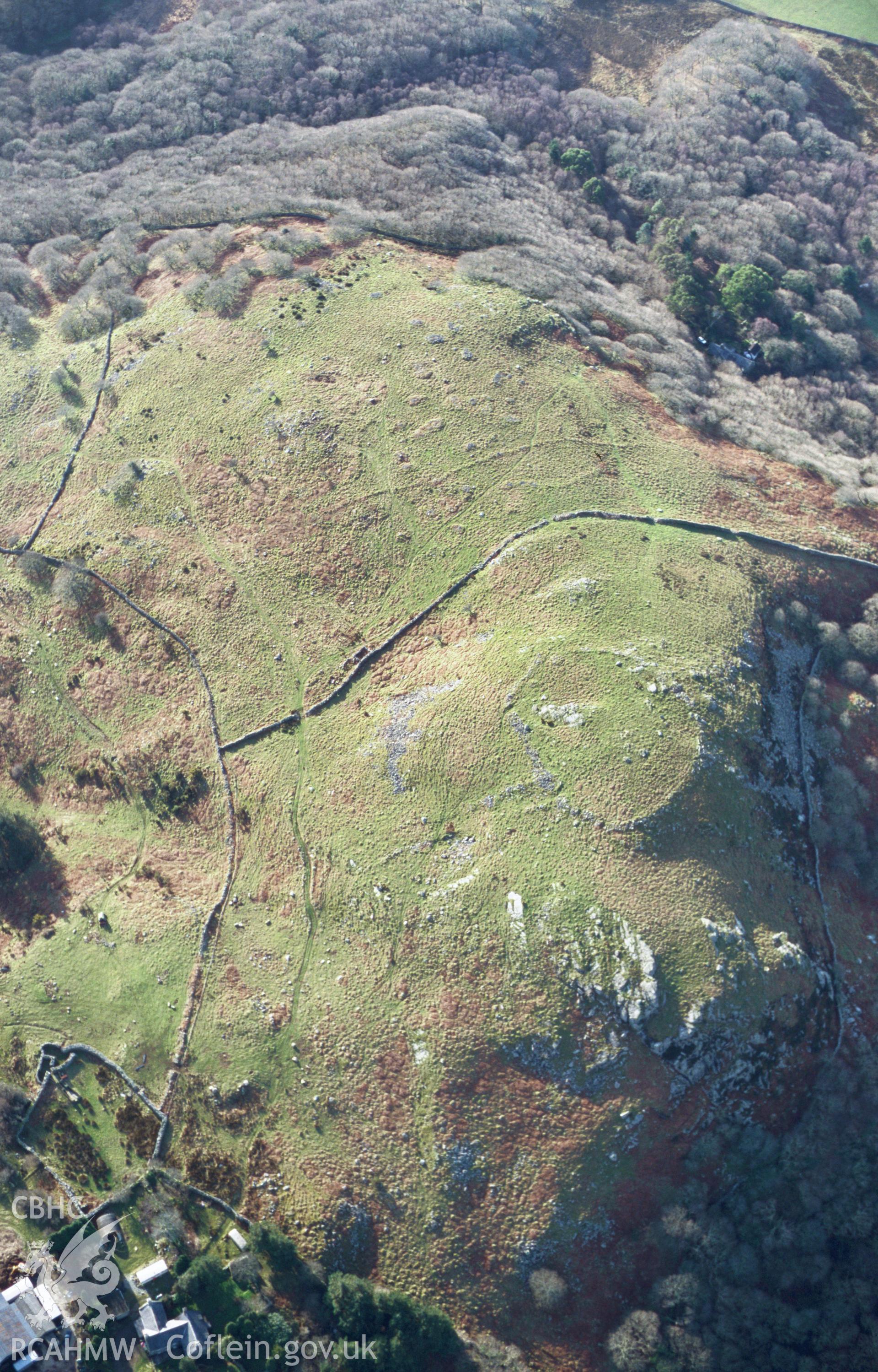 Slide of RCAHMW colour oblique aerial photograph of Clogwyn Arllef Hillfort, taken by T.G. Driver, 2005.