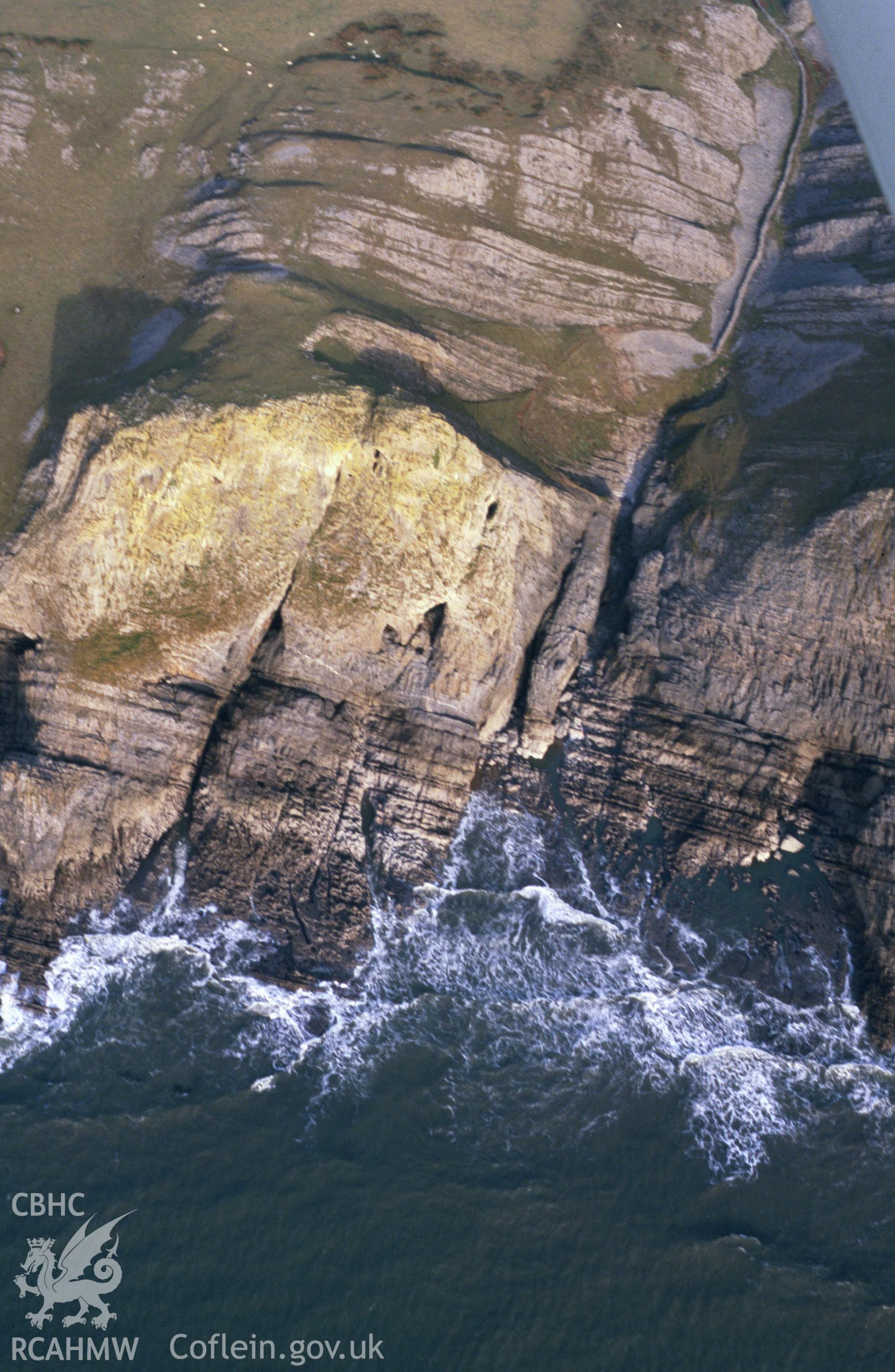 RCAHMW colour oblique aerial photograph of Goat's Hole, Paviland, cave, stereo colour right eye. Taken by Toby Driver on 19/12/2002