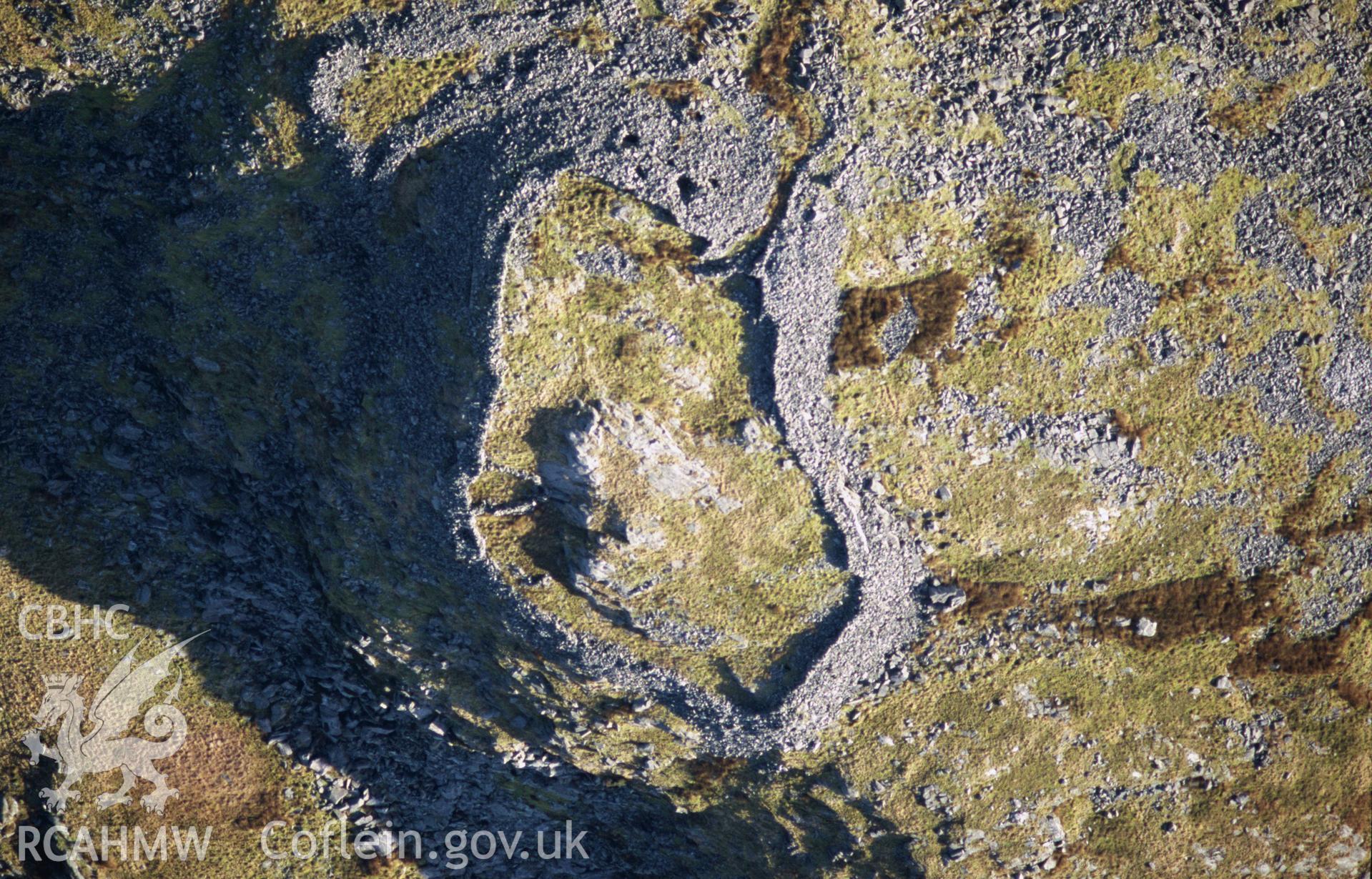 Slide of RCAHMW colour oblique aerial photograph of Craig y Dinas, Dyffryn Ardudwy, taken by T.G. Driver, 2005.