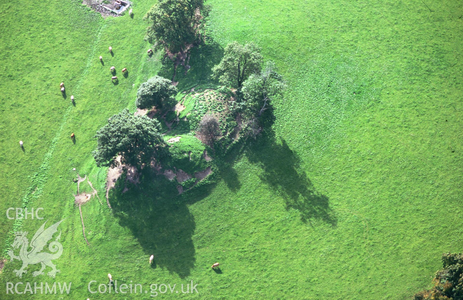 RCAHMW colour slide oblique aerial photograph of Llyssun Castle, Llanerfyl, taken by C.R. Musson, 09/10/94