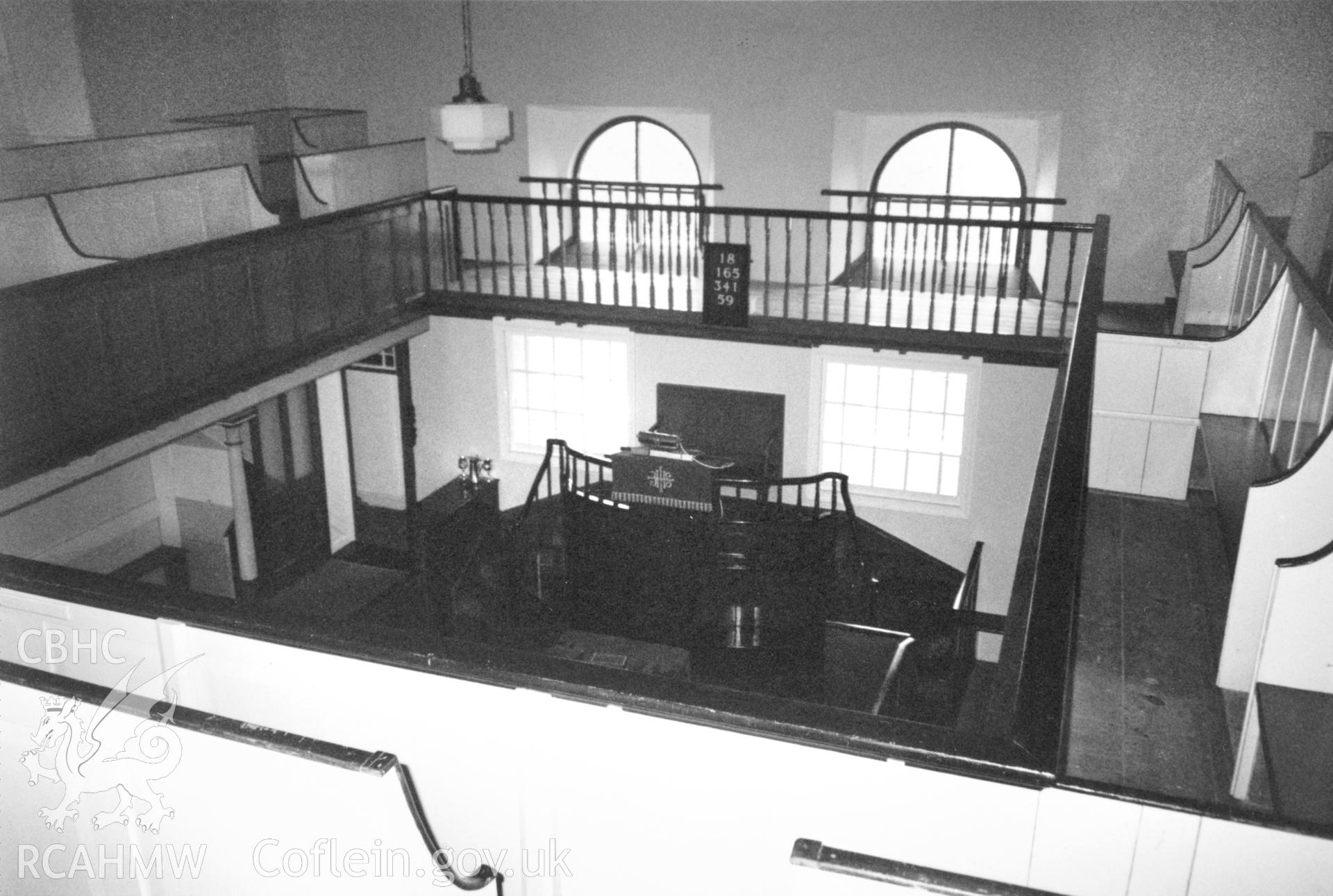 Digital copy of a black and white photograph showing an interior view of Capel Newydd  Welsh Calvinistic Methodist Chapel, Boncath, taken by Robert Scourfield, c.1996.