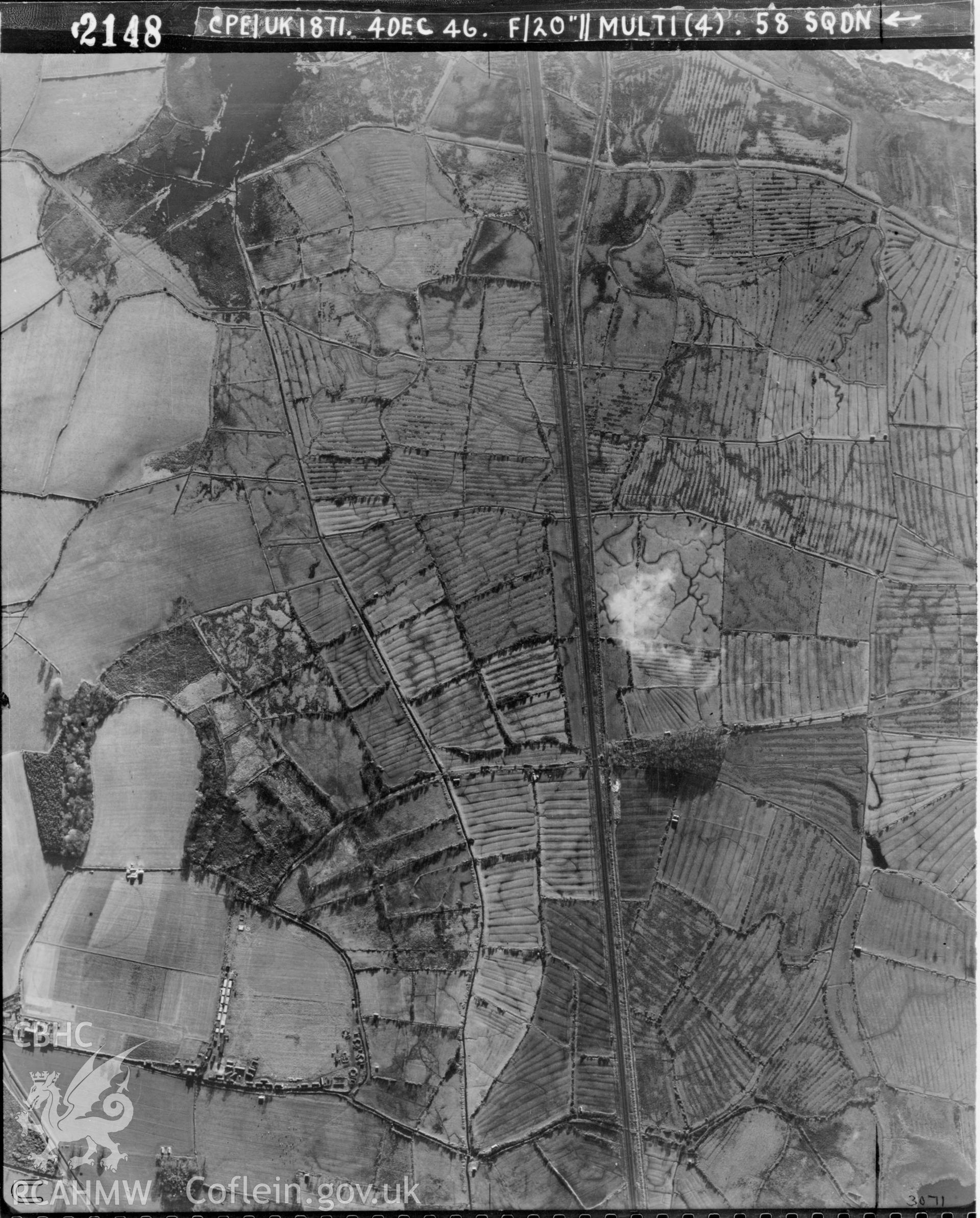 Black and white vertical aerial photograph taken by the RAF on 04/12/1946 centred on SS79108435 at a scale of 1:10000. The photograph includes part of Margam Moors community in Neath, Port Talbot.