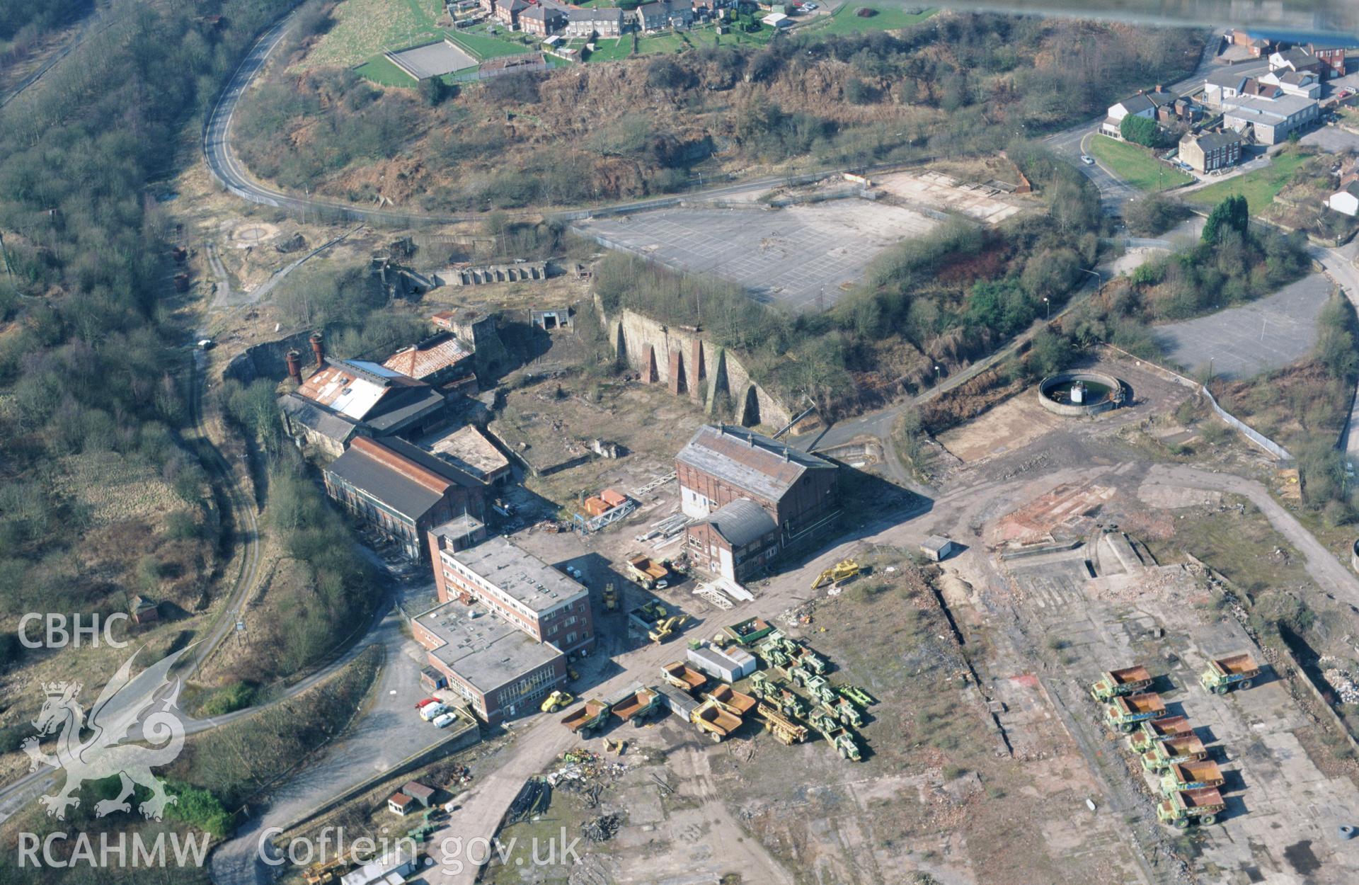 RCAHMW colour oblique aerial photograph of Brymbo Ironworks. Taken by Toby Driver on 14/03/2003