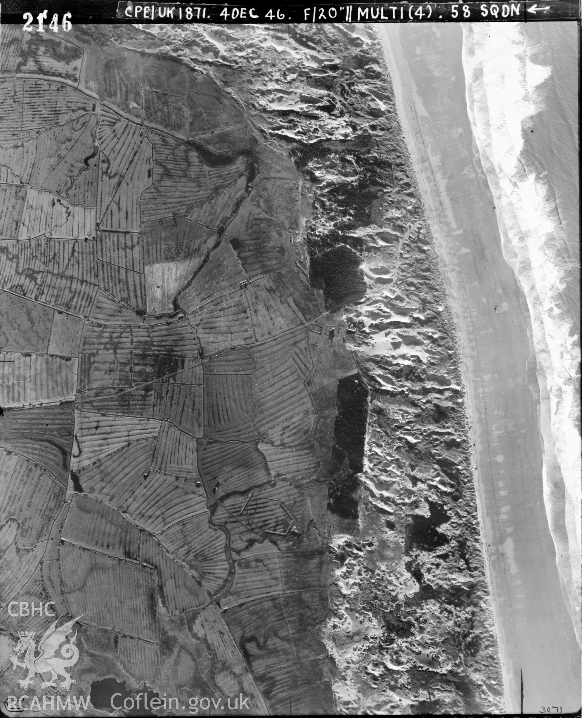 Black and white vertical aerial photograph taken by the RAF on 04/12/1946 centred on SS77878401 at a scale of 1:10000. The photograph includes part of Margam Moors community in Neath, Port Talbot.