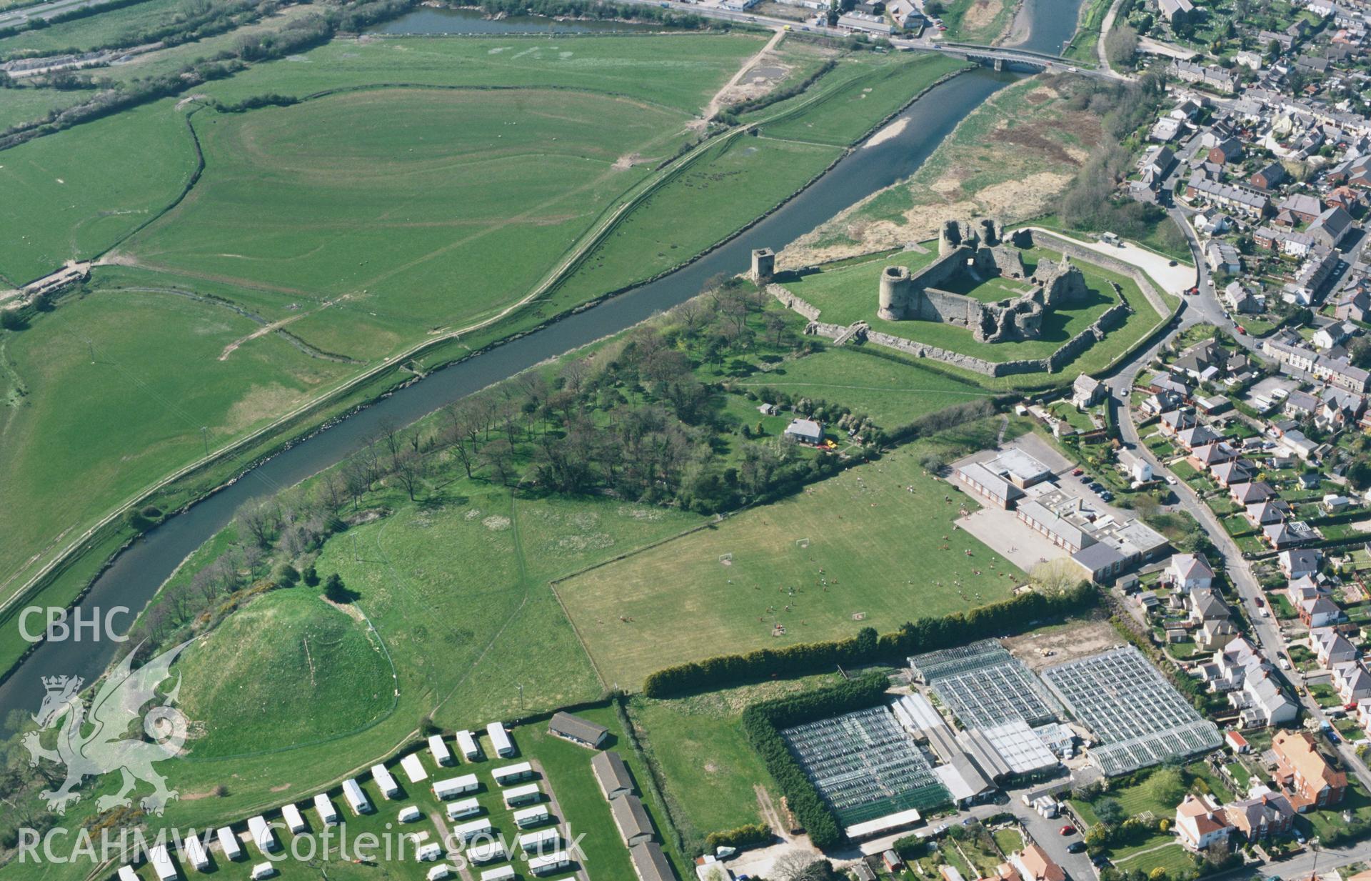 RCAHMW colour oblique aerial photograph of Twt Hill, Motte, Rhuddlan. Taken by Toby Driver on 08/04/2003