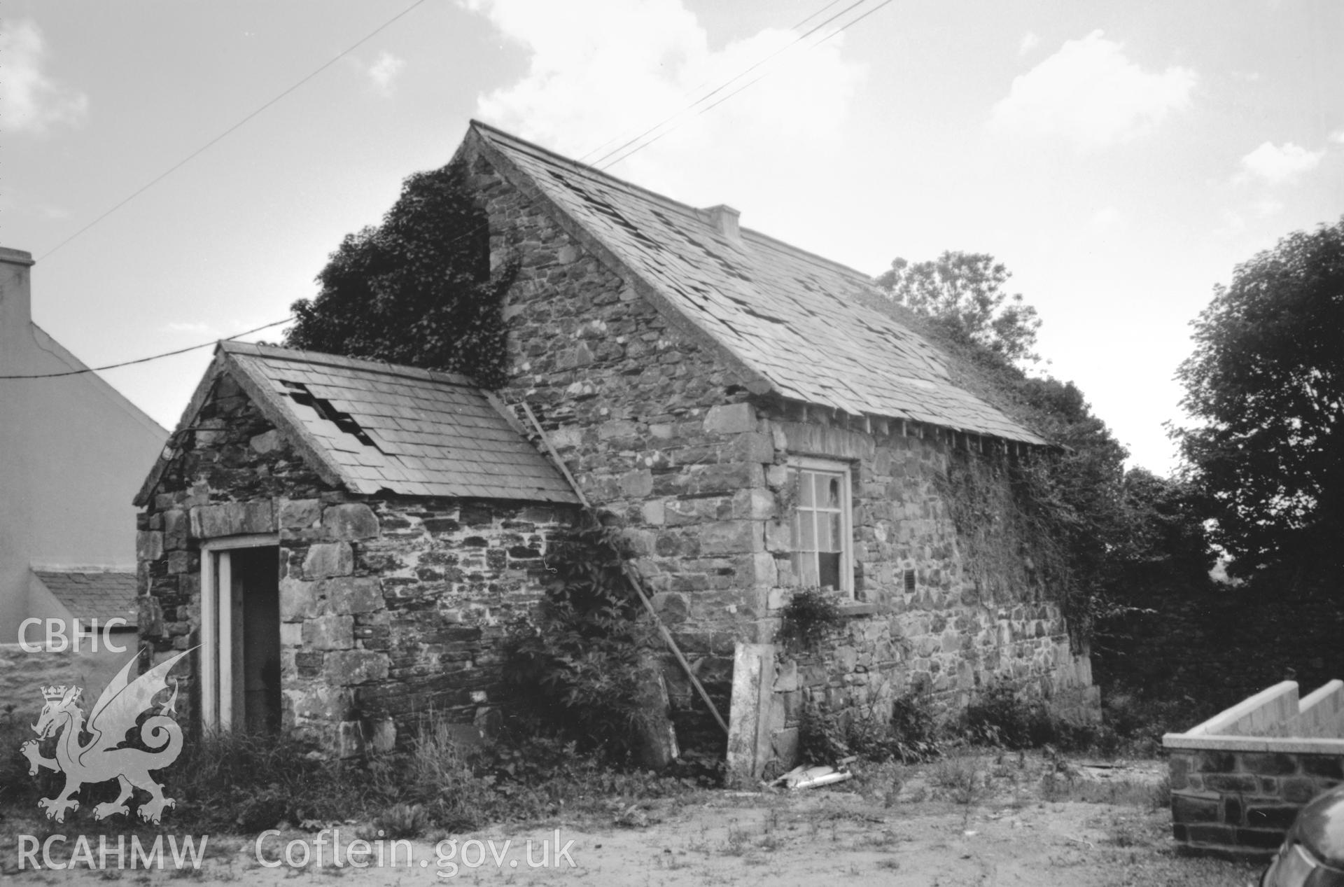 Digital copy of a black and white photograph showing an exterior view of Little Newcastle School, Puncheston, taken by Robert Scourfield, c.1996.